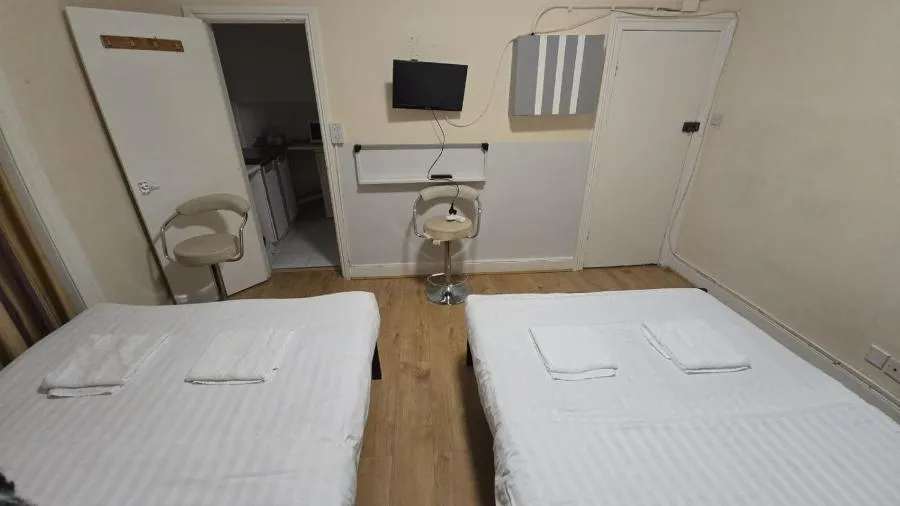 Photo of the whole room, Bed in Anwar House