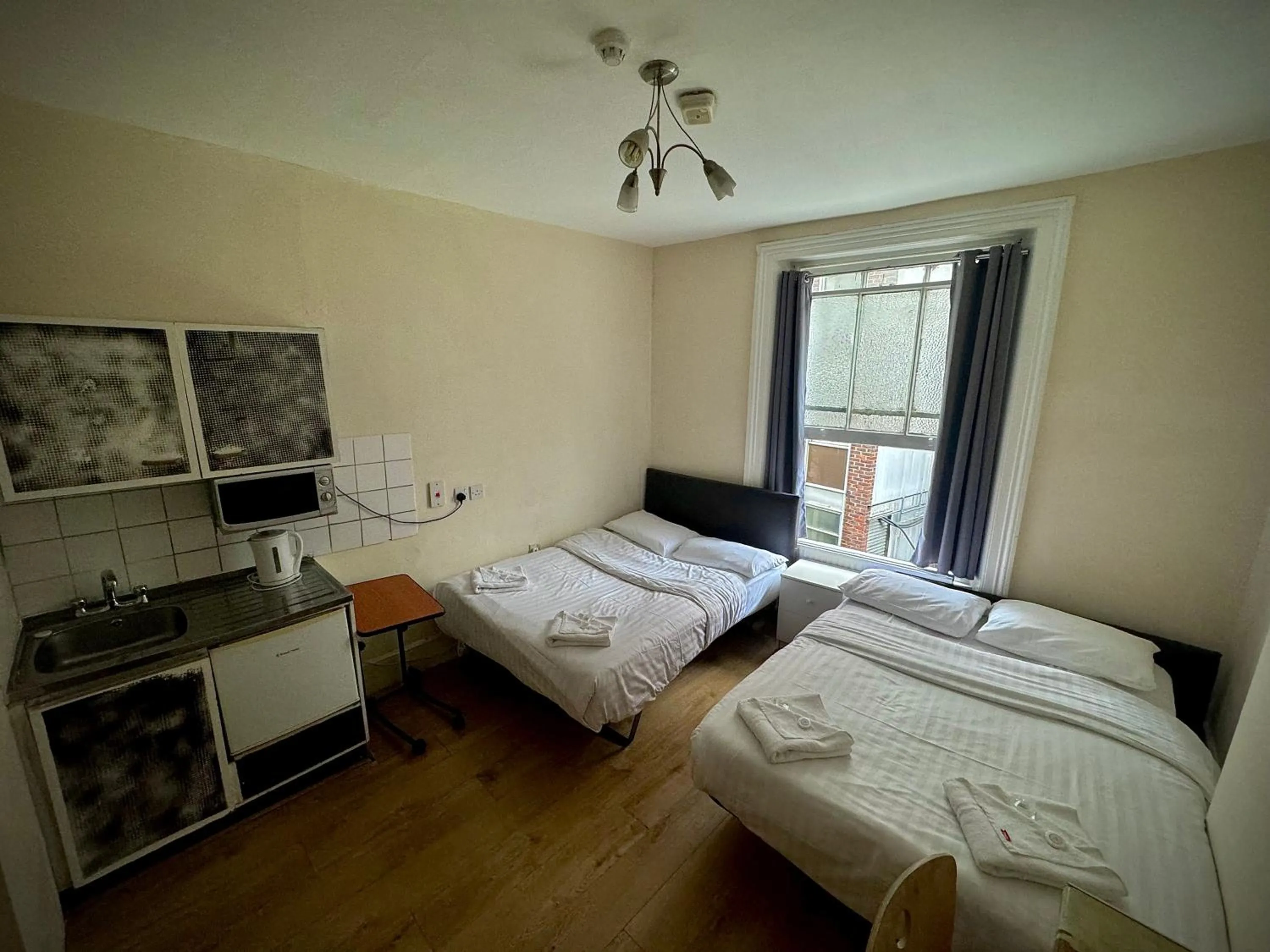 Photo of the whole room, Bed in Anwar House