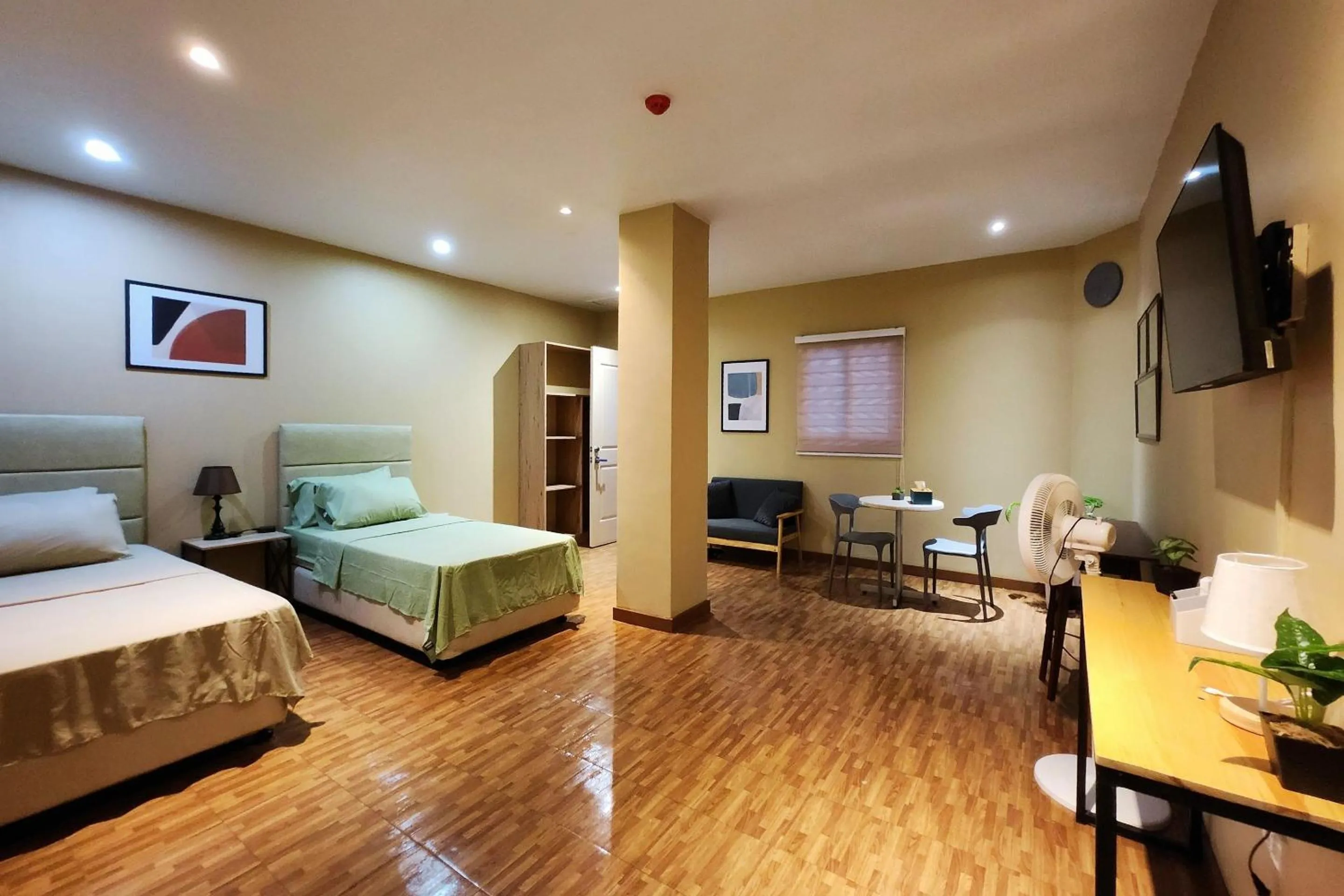 Bed in Freddo Studio Apartelle