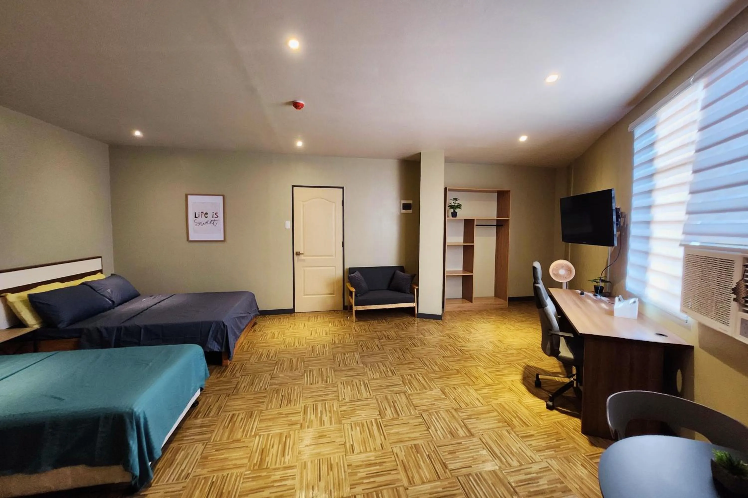 Bed in Freddo Studio Apartelle