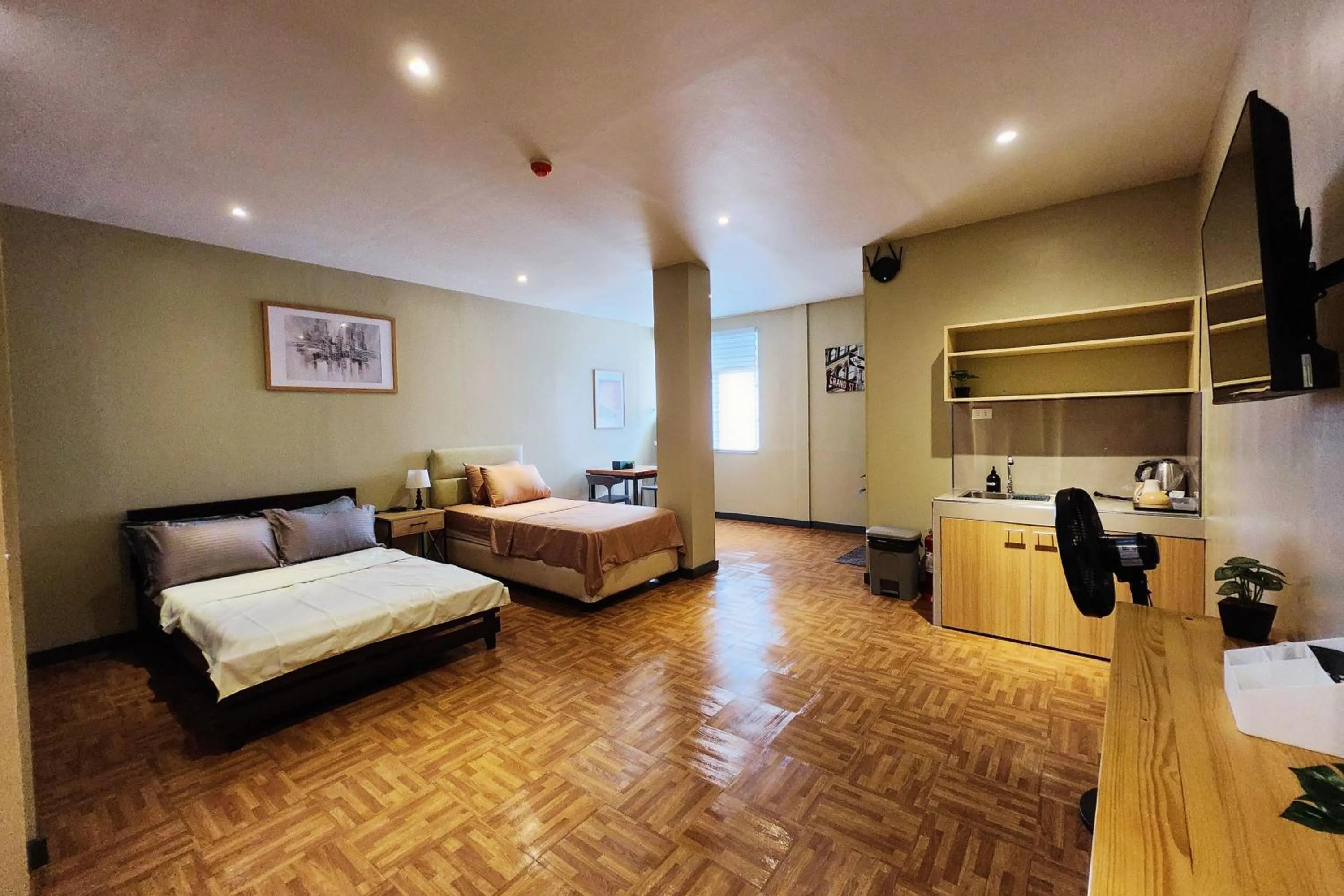 Bed in Freddo Studio Apartelle