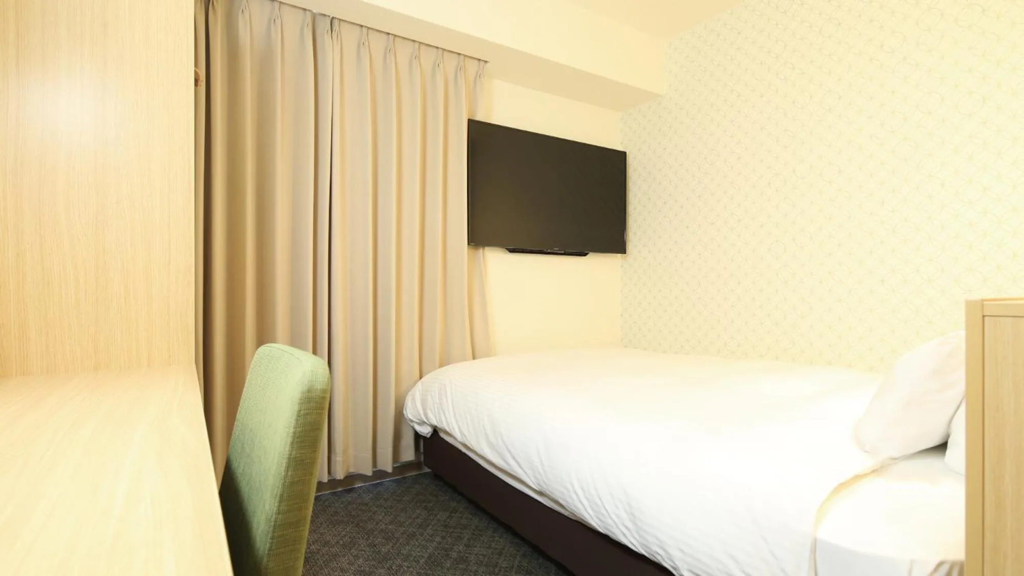 Bed in AB Hotel Sakaihigashi