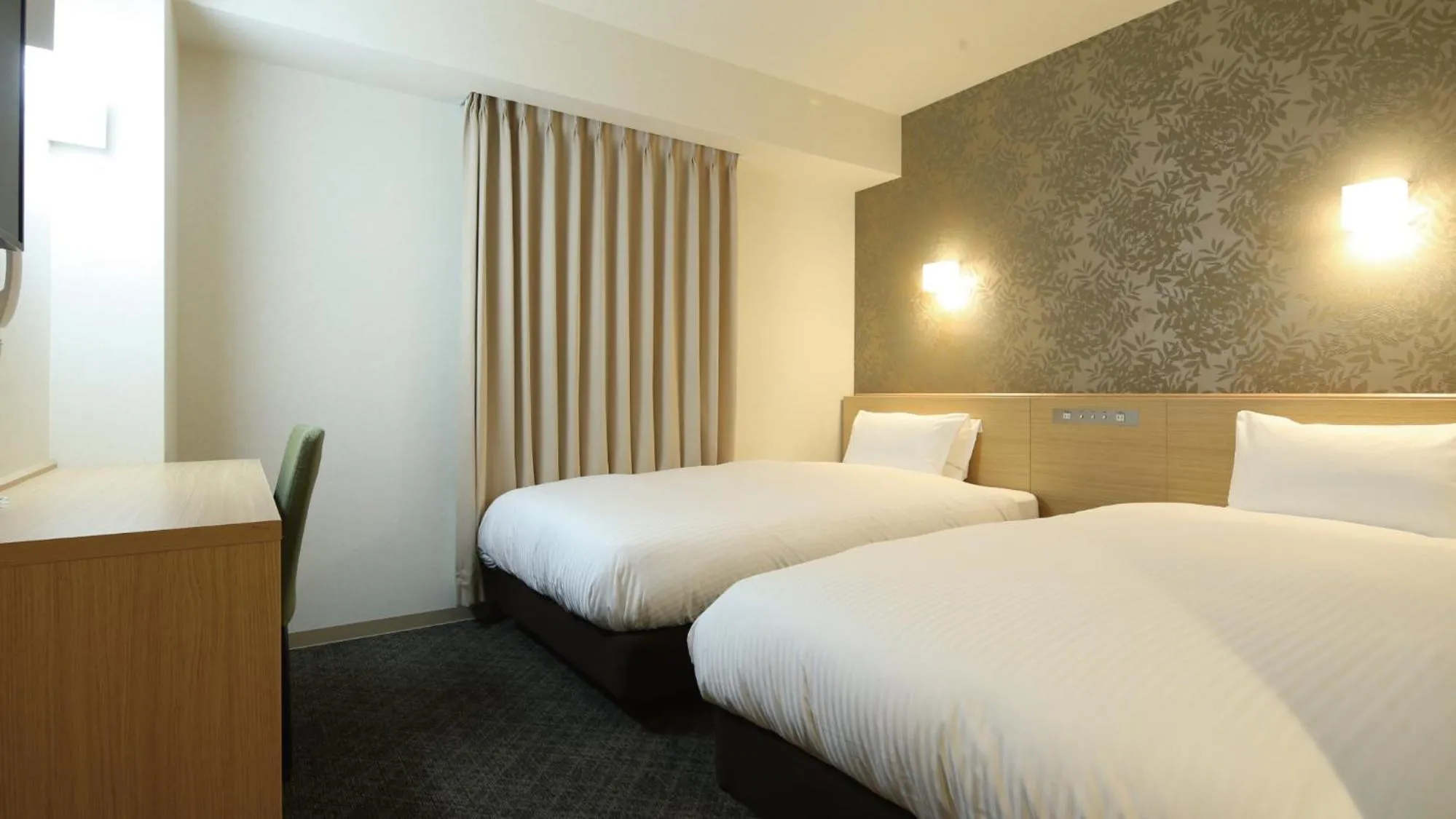 Bed in AB Hotel Sakaihigashi