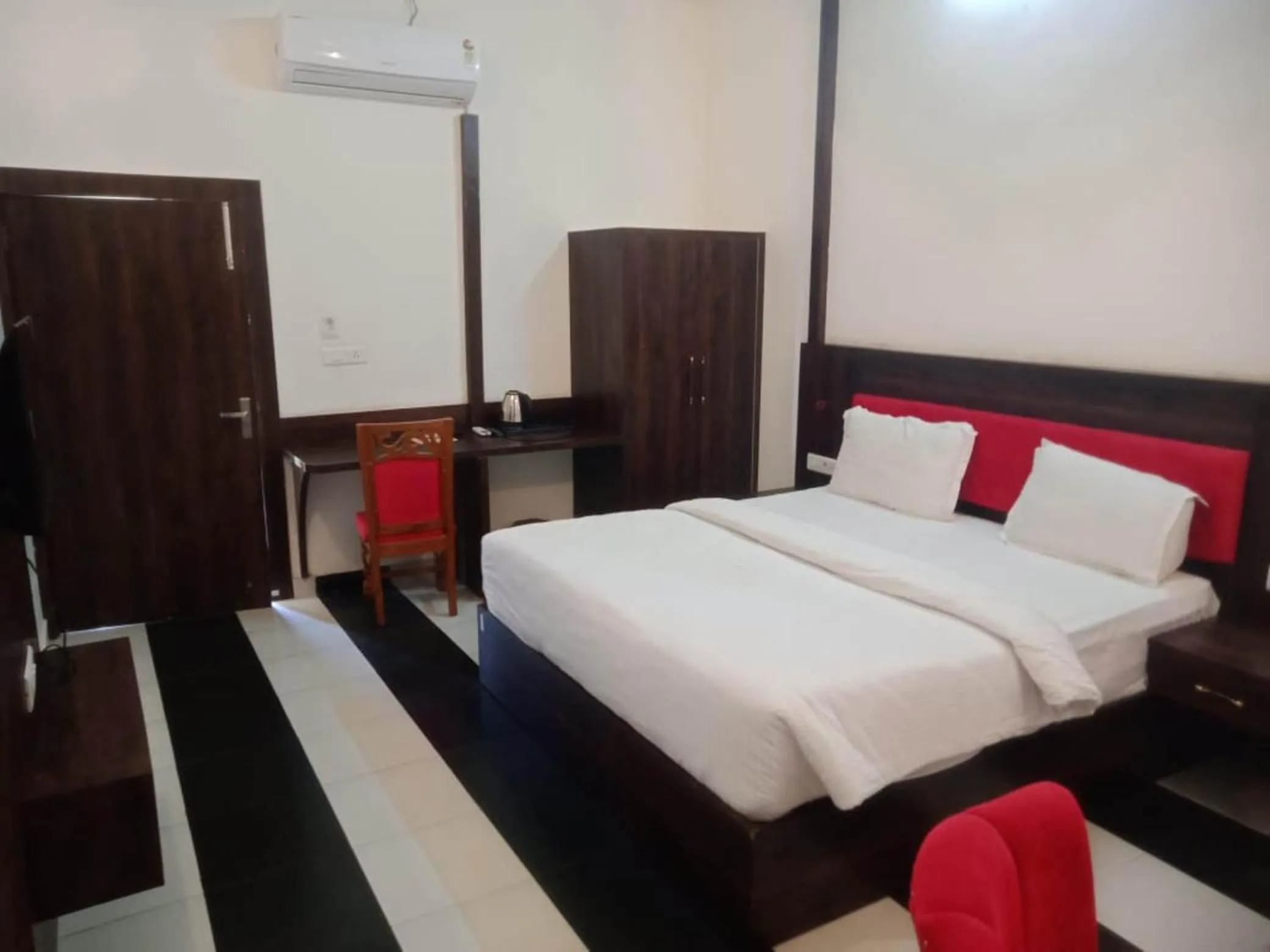 Bed in DHANWA RESORT, A UNIT OF SATKAR HOTEL AND RESORTs