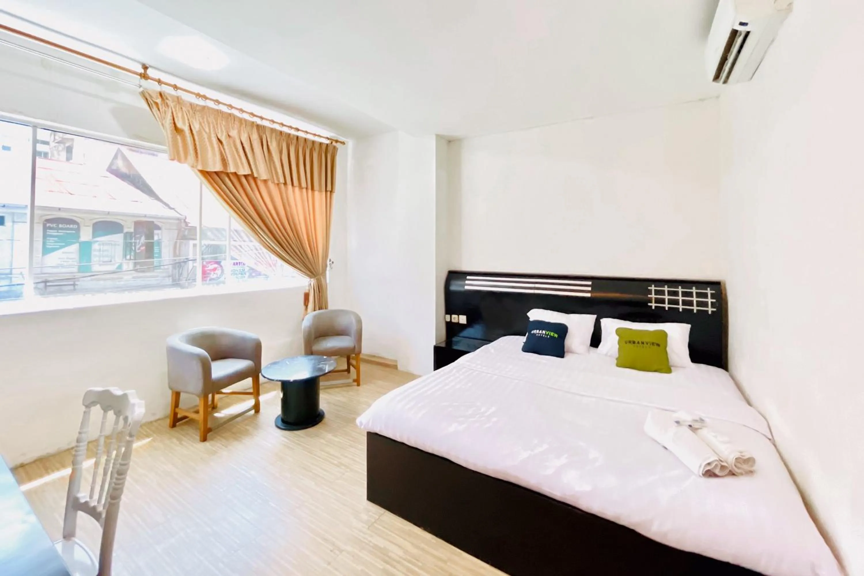 Bedroom, Bed in Urbanview Hotel Grand Mohaga Medan