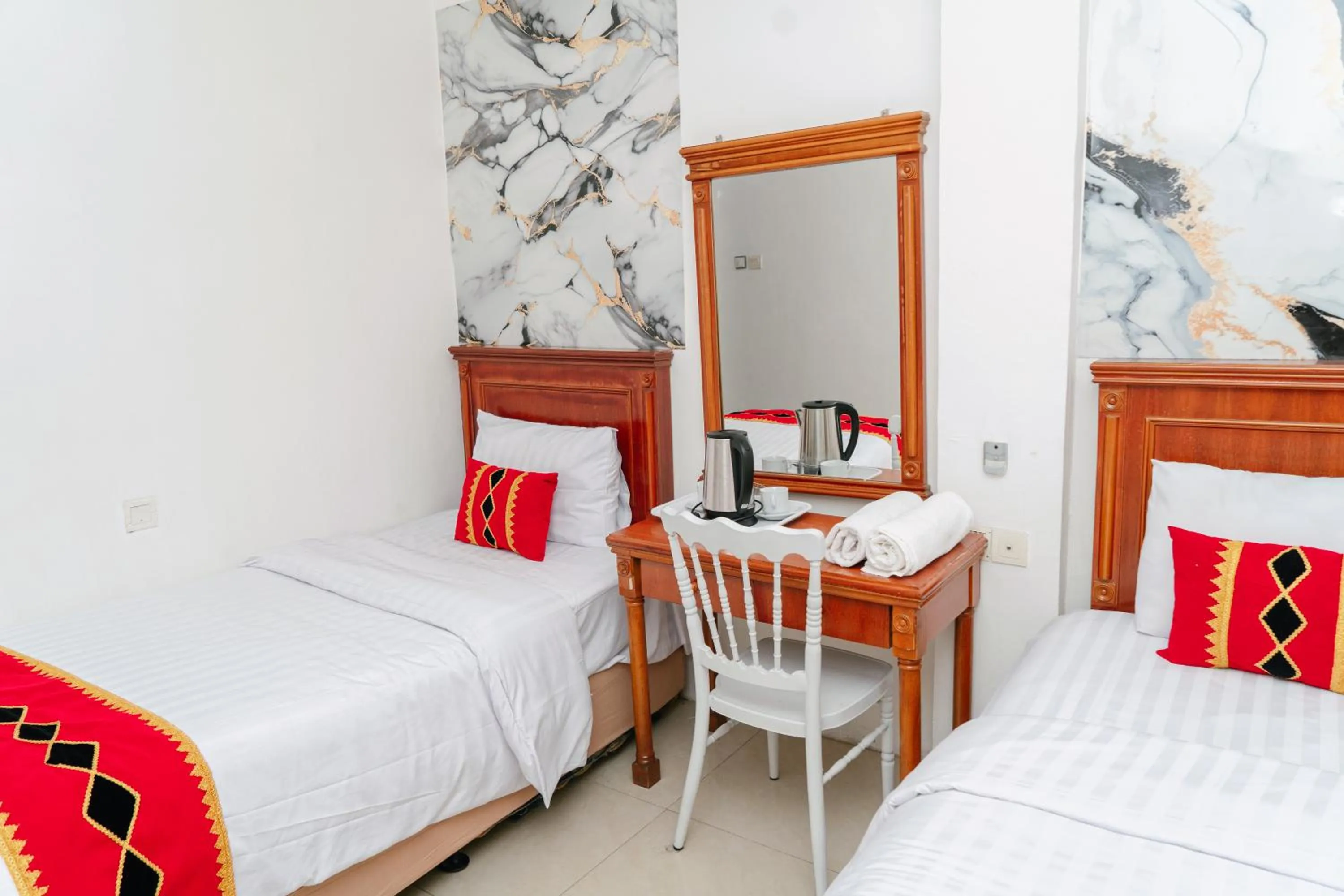 Standard Twin Room in Urbanview Hotel Grand Mohaga Medan