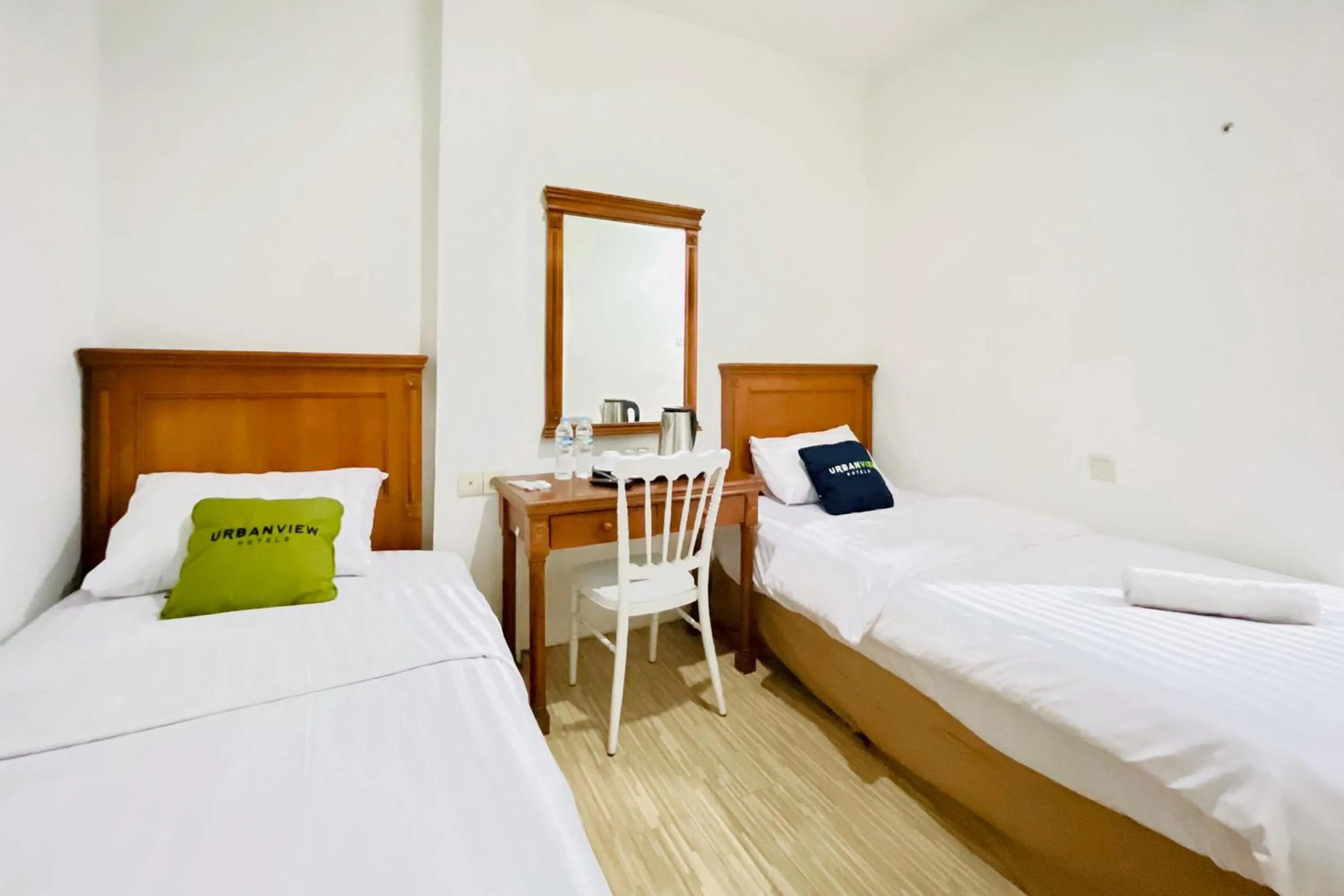 Bedroom, Bed in Urbanview Hotel Grand Mohaga Medan