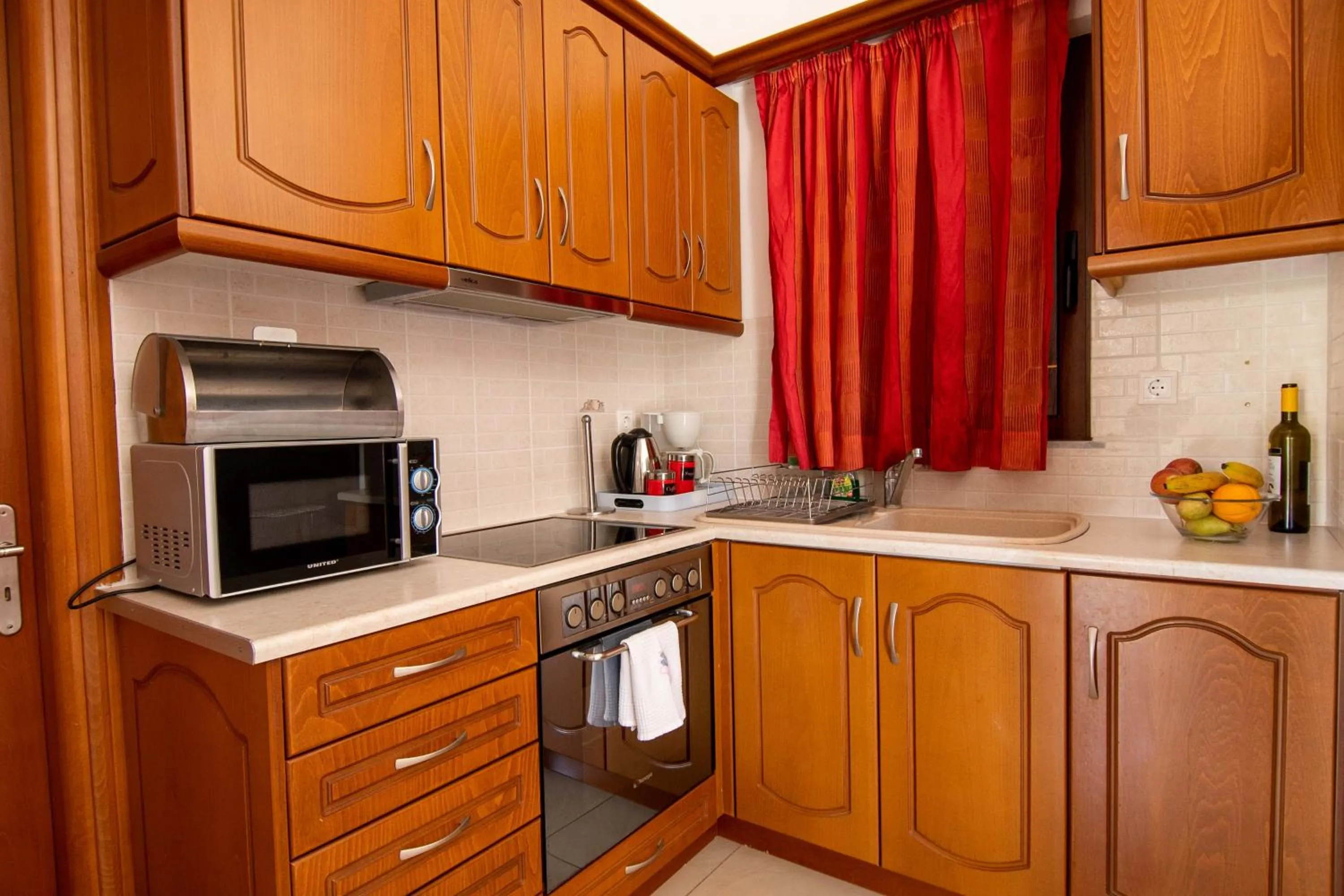Kitchen or kitchenette in Kalloni village apartments