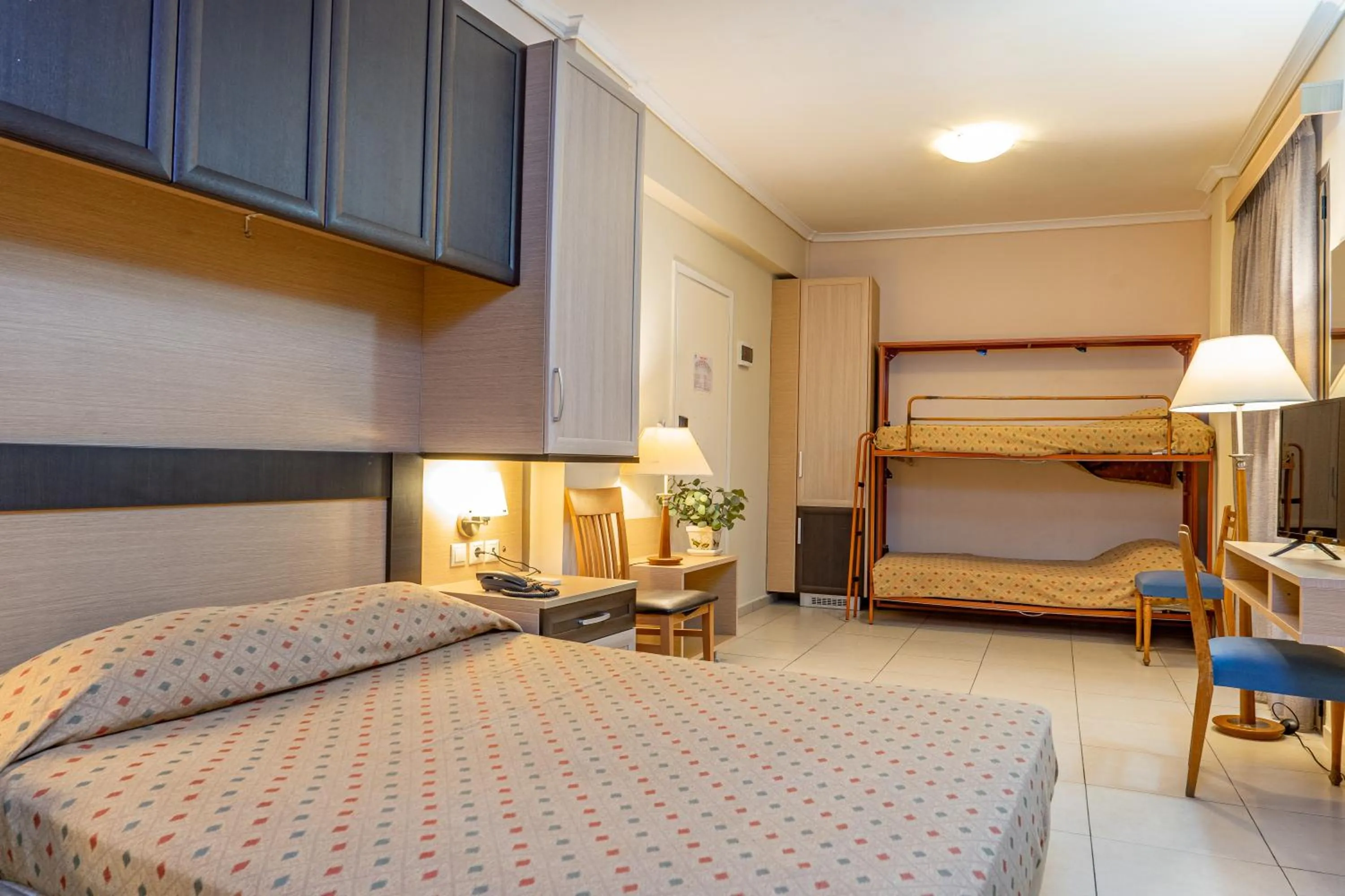 Bed in Marmari Bay Hotel