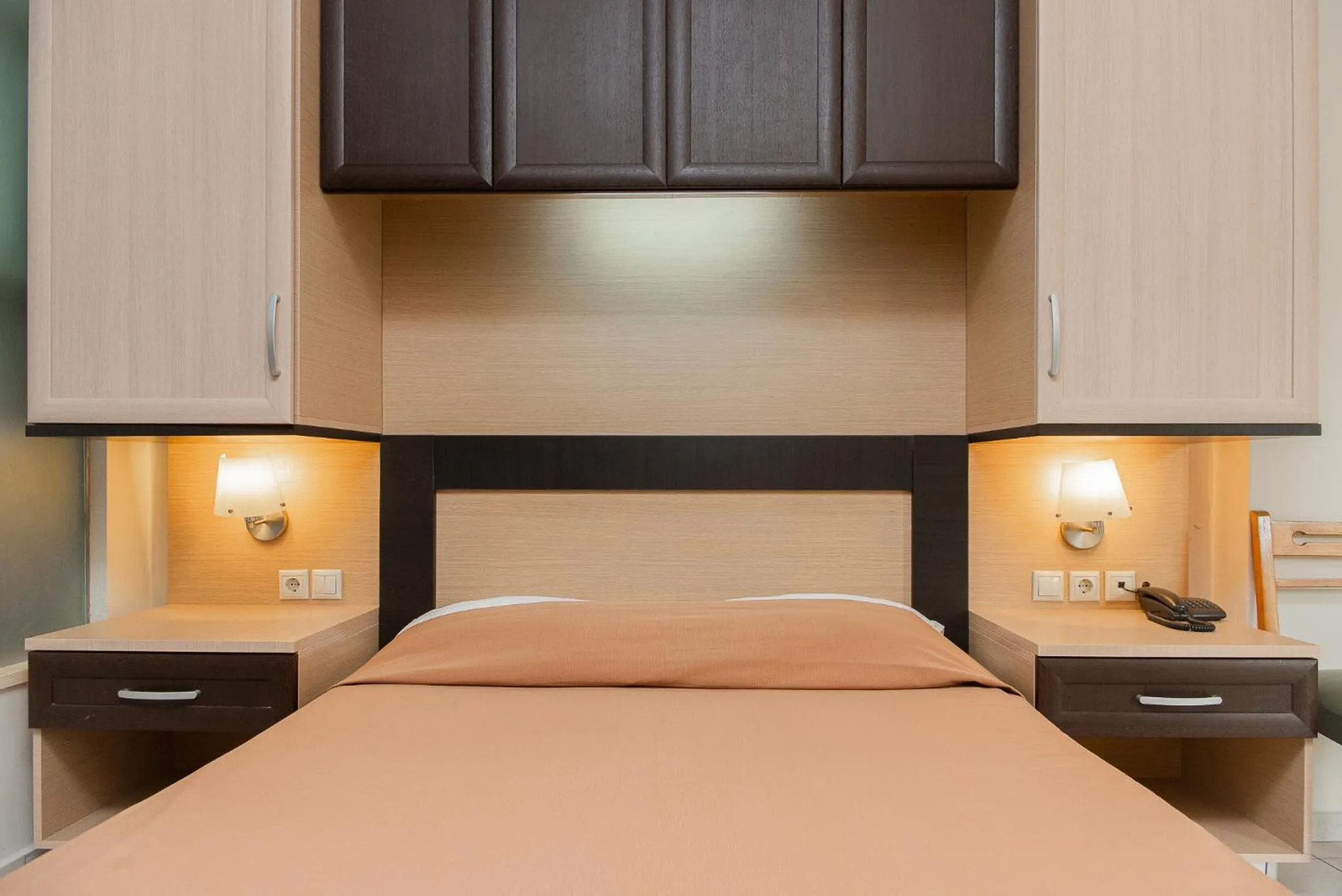 Bed in Marmari Bay Hotel