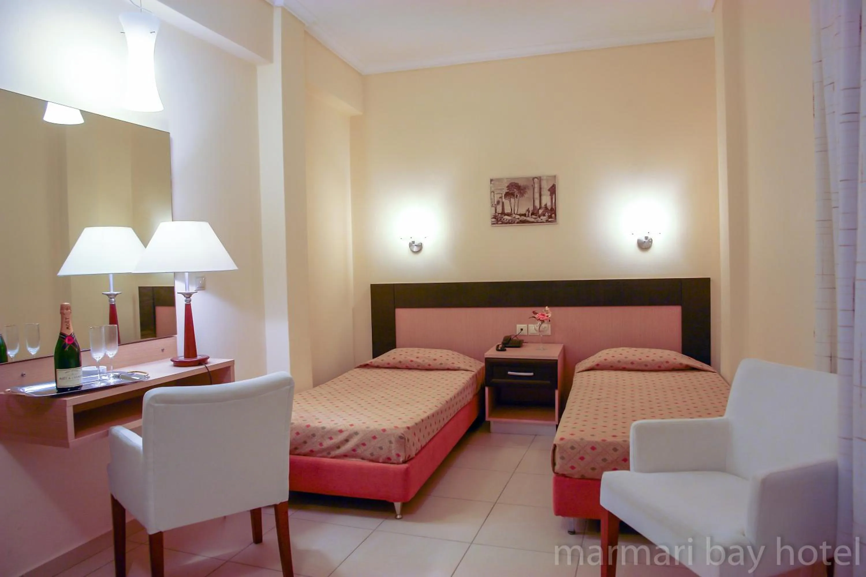 Bed in Marmari Bay Hotel