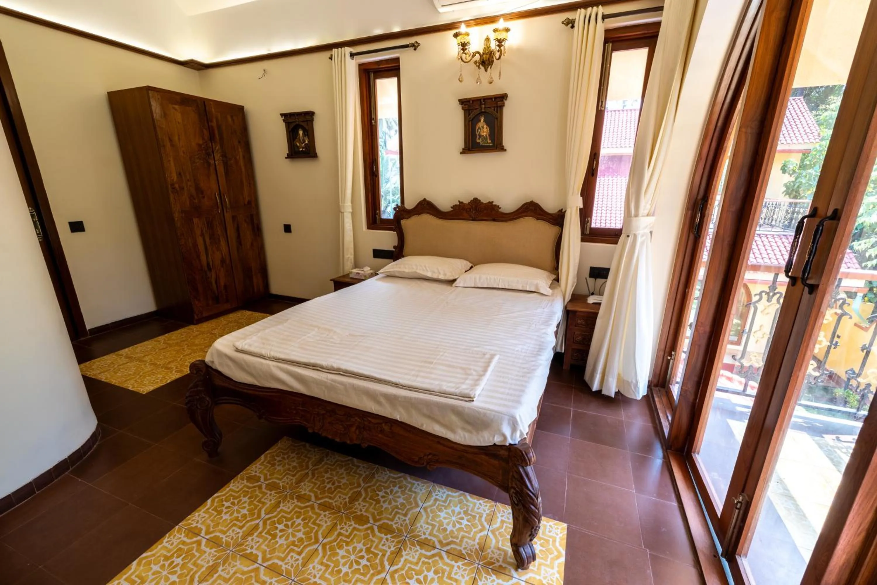 Bed in Ishaan Holiday Home