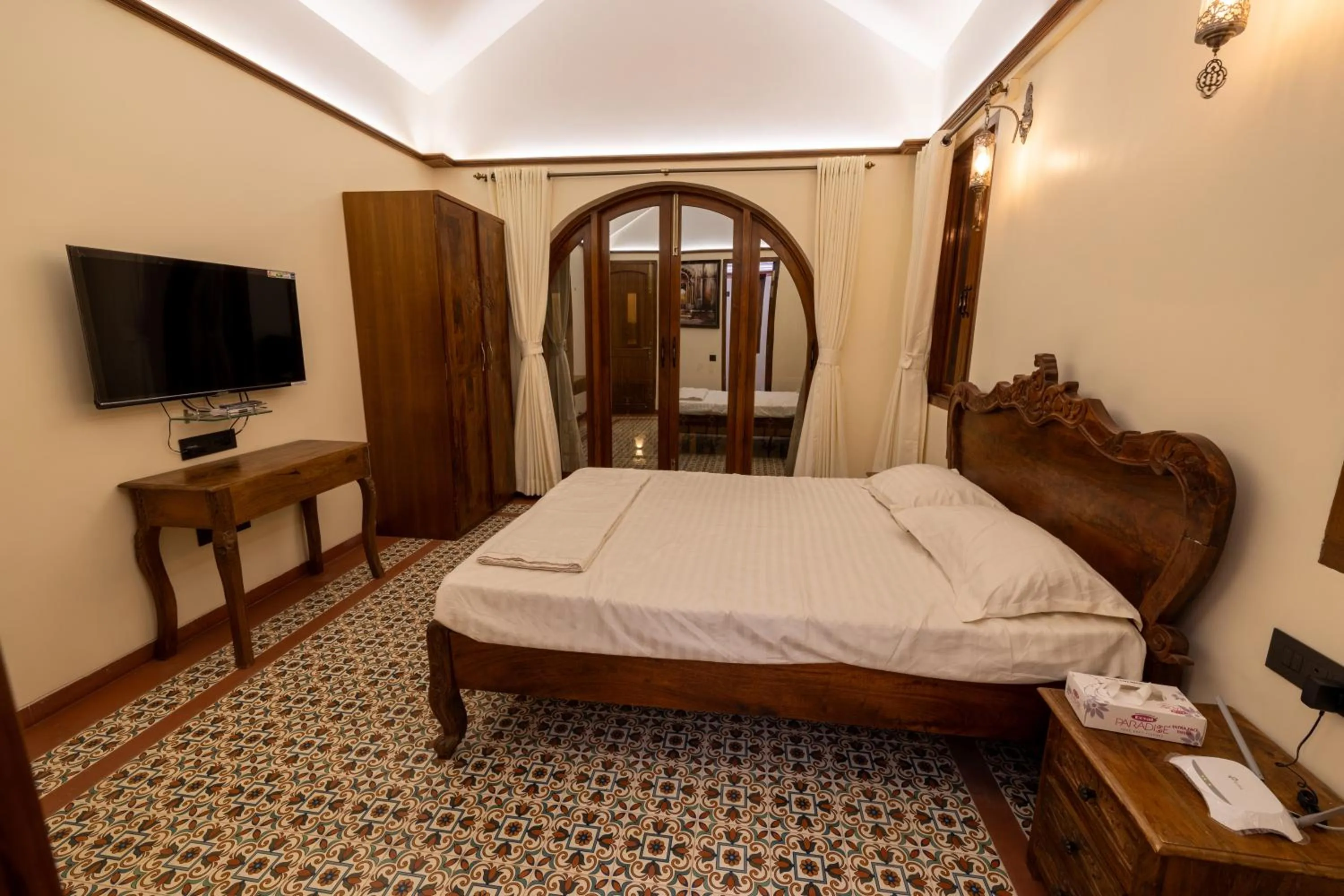 Bed in Ishaan Holiday Home