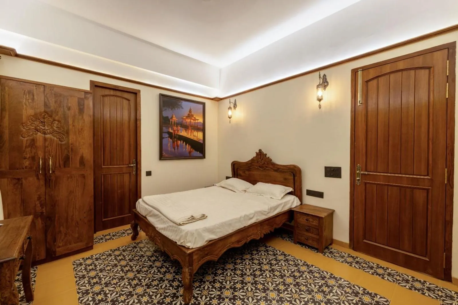 Bed in Ishaan Holiday Home