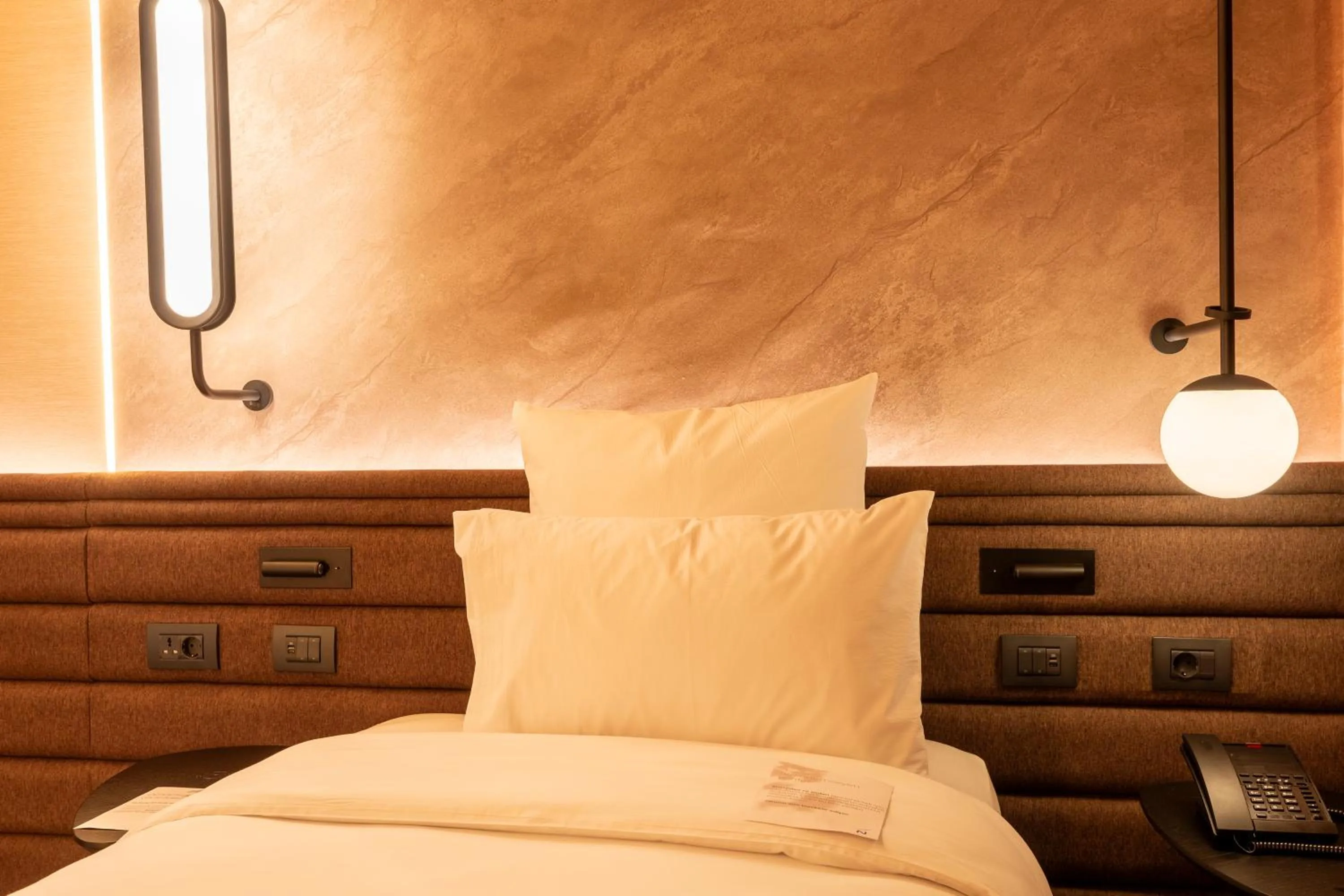 Bed in Novotel Istanbul Bomonti