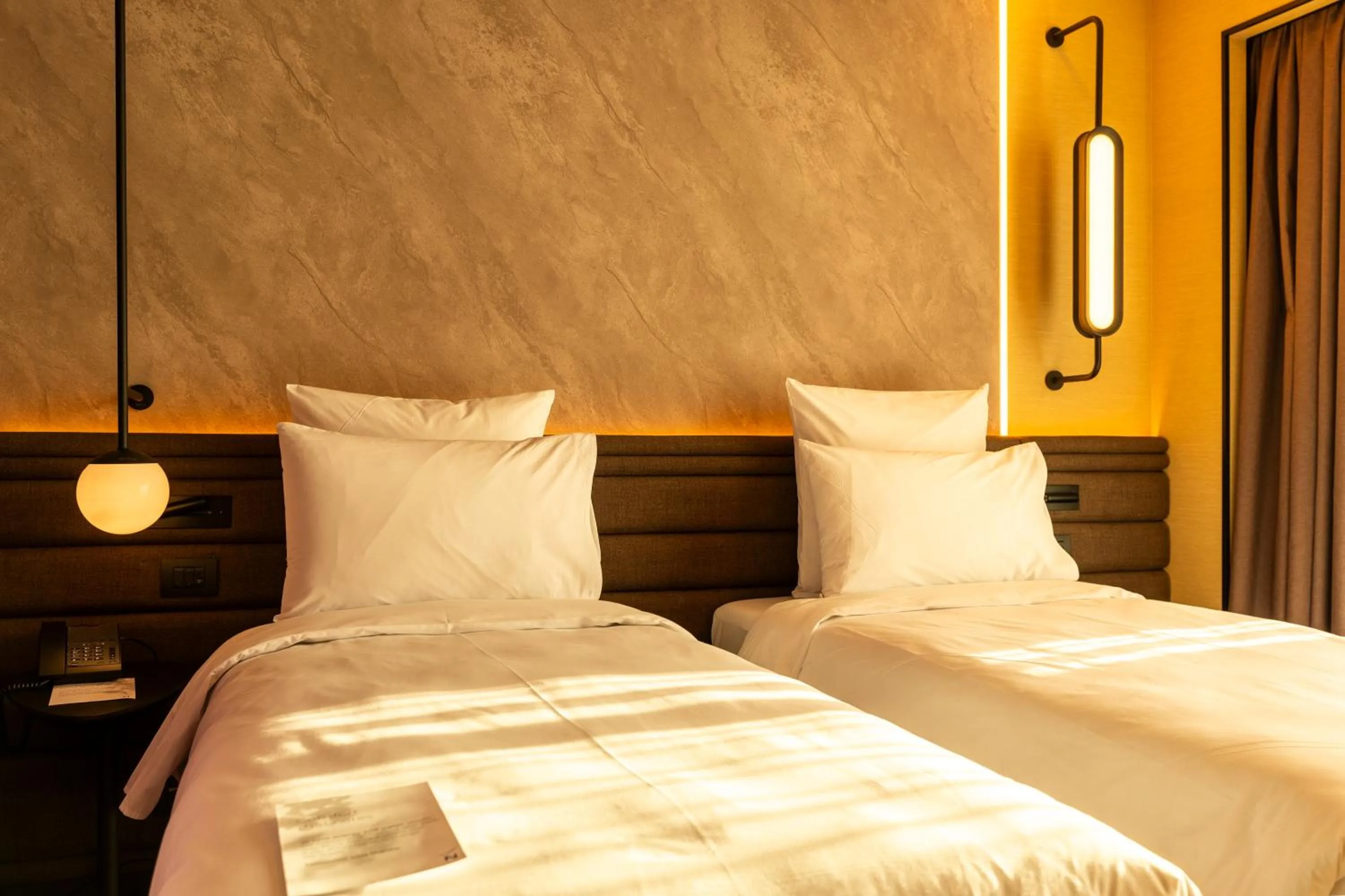 Bed in Novotel Istanbul Bomonti