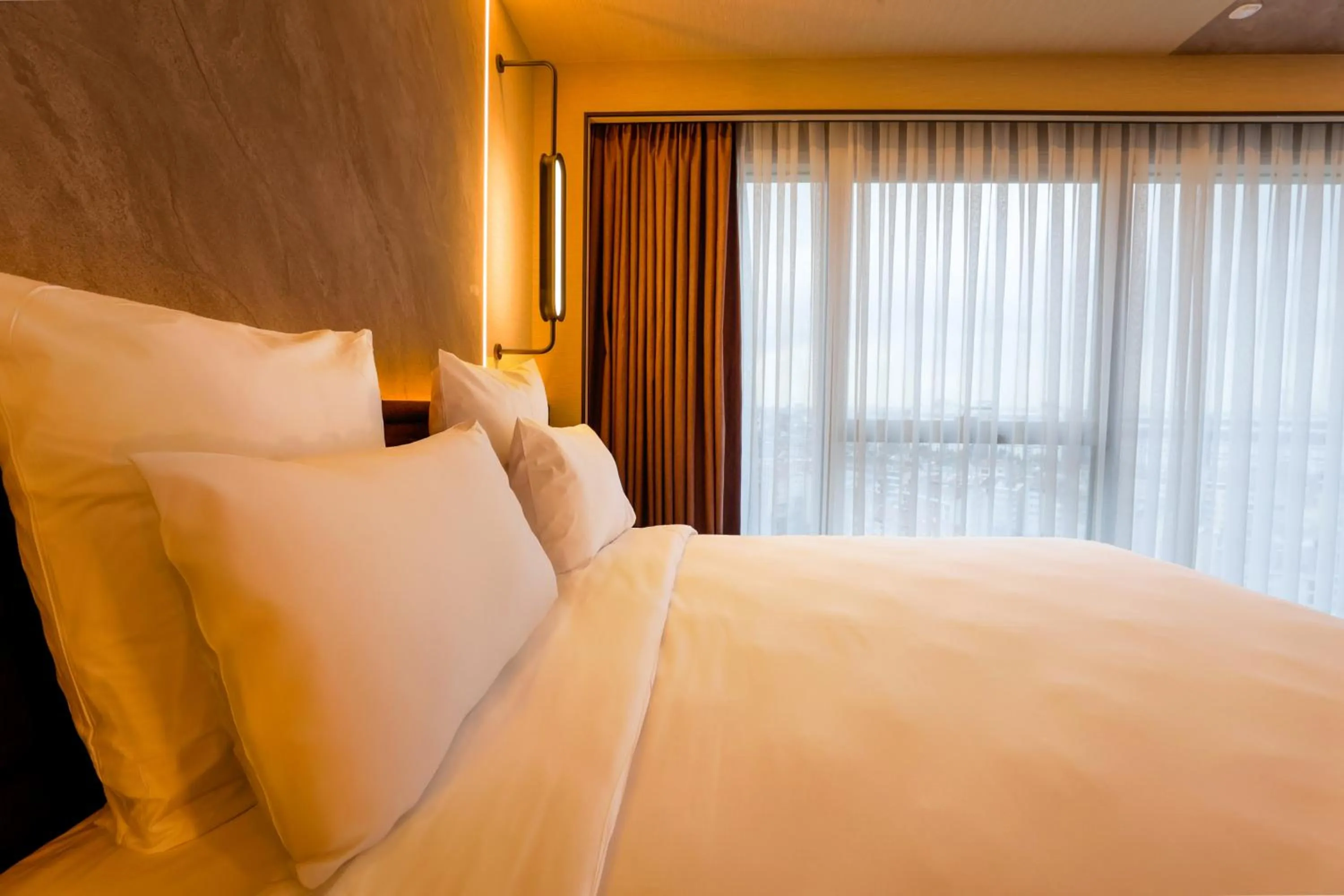 Bed in Novotel Istanbul Bomonti