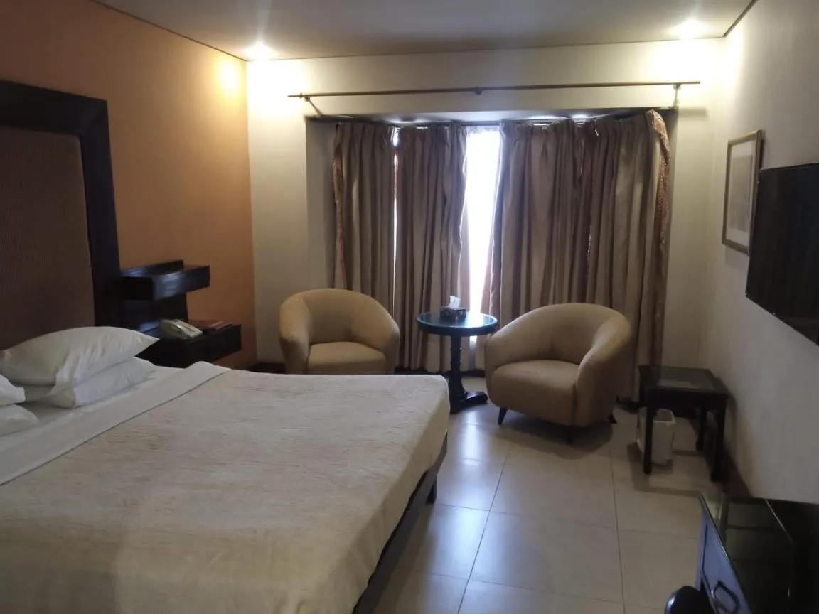 Photo of the whole room, Bed in Regency Inn Hotel