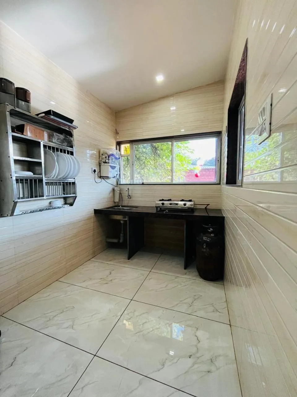 Kitchen or kitchenette in Green Heaven River Side Resort and Villa