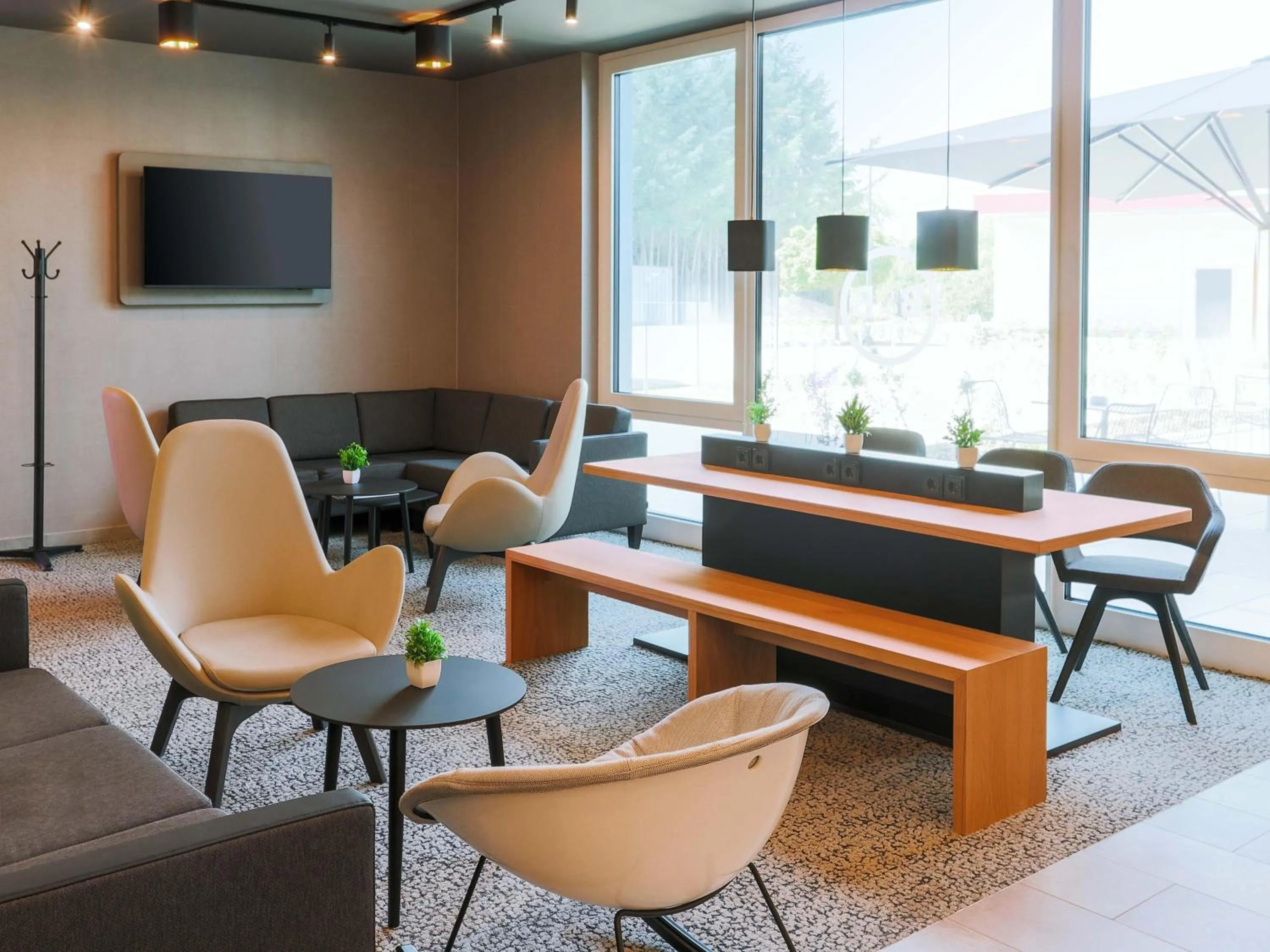 Lobby or reception in B&B HOTEL Bruchsal-Karlsdorf