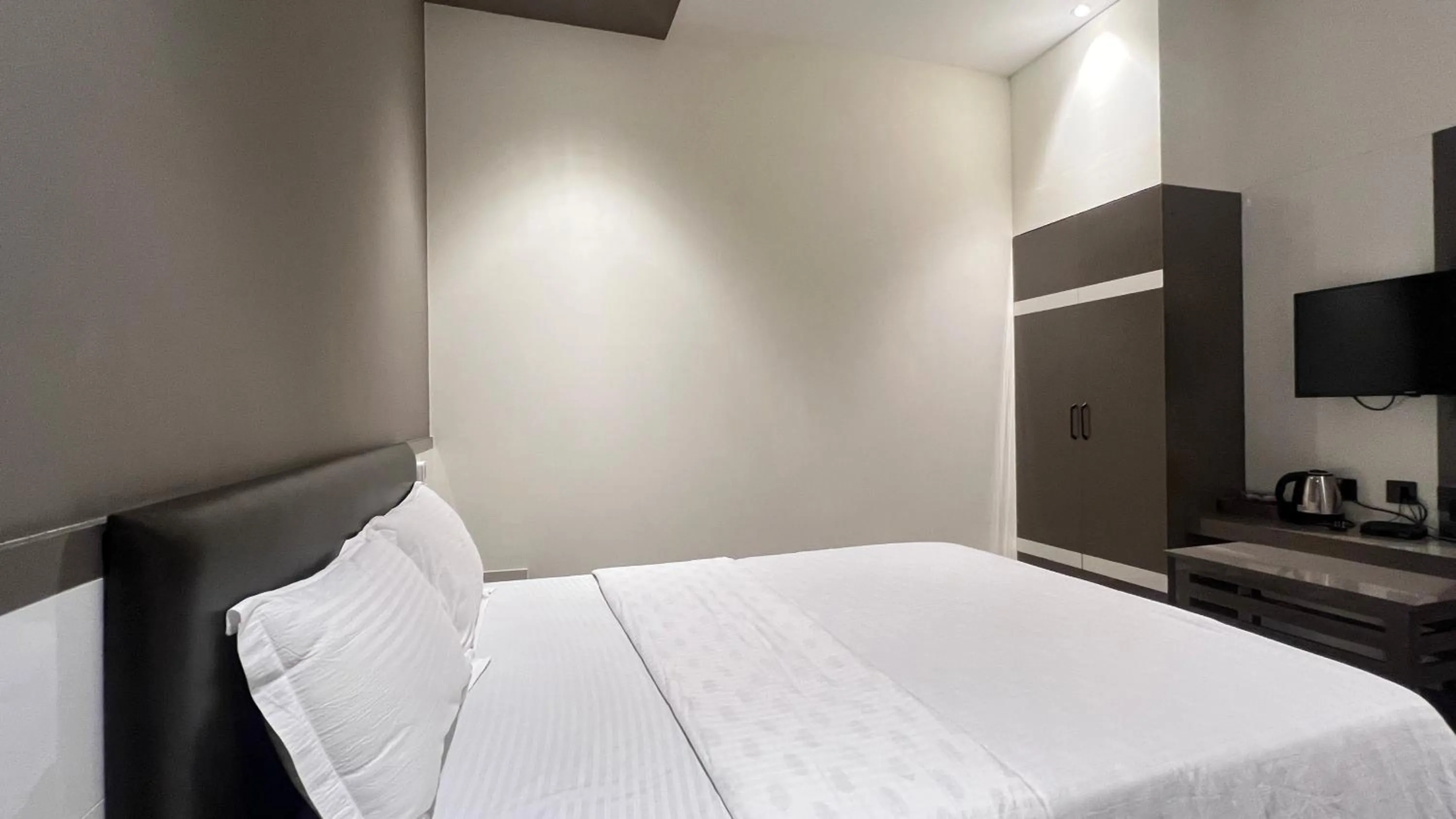 Bed in MAS Residency