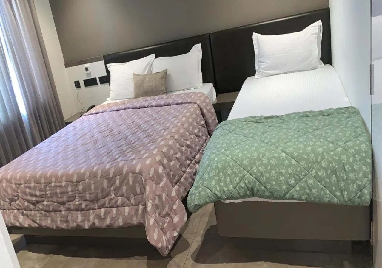 Photo of the whole room, Bed in MAS Residency