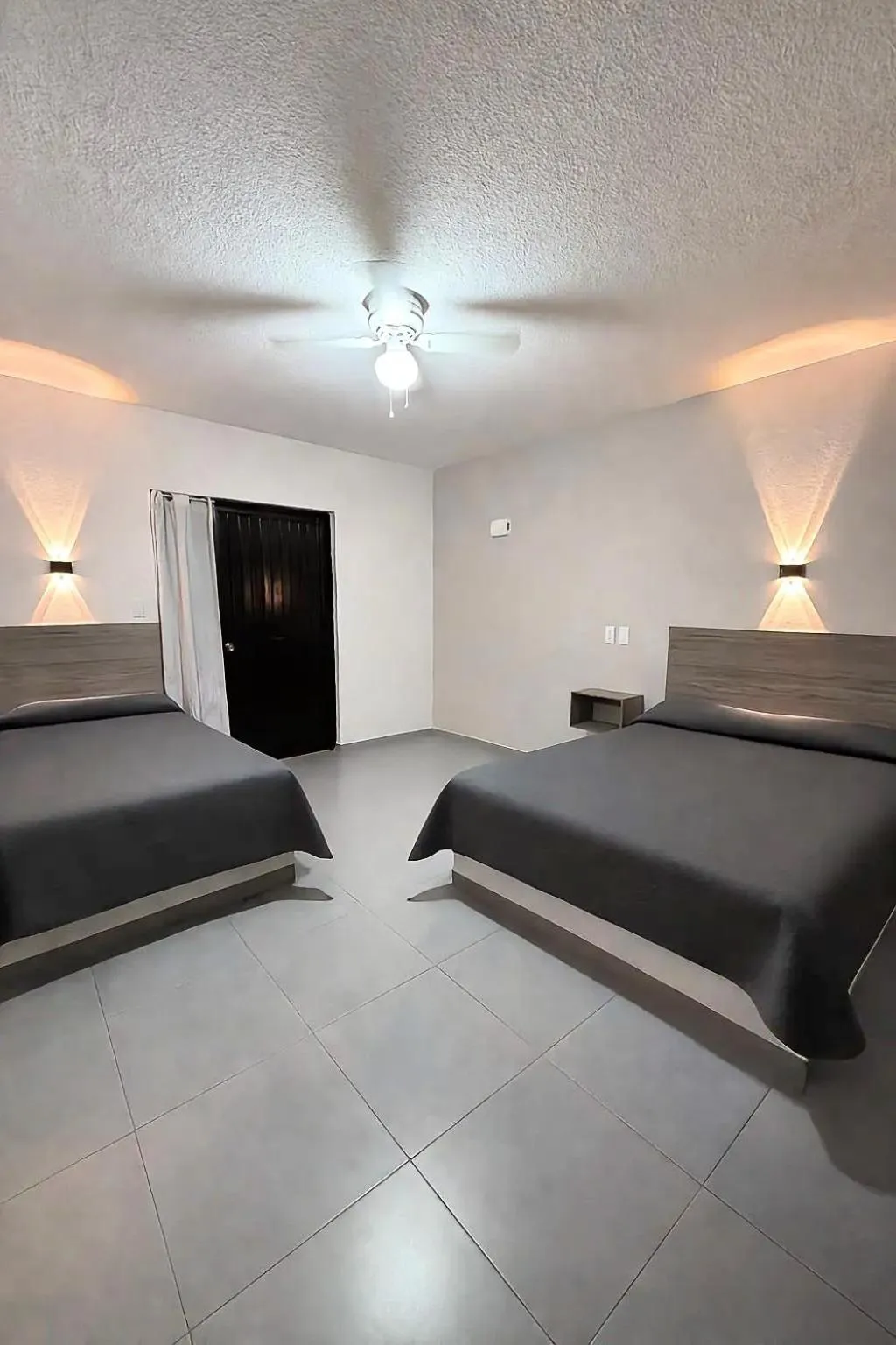 Photo of the whole room, Bed in Hotel Nuevo Vallarta