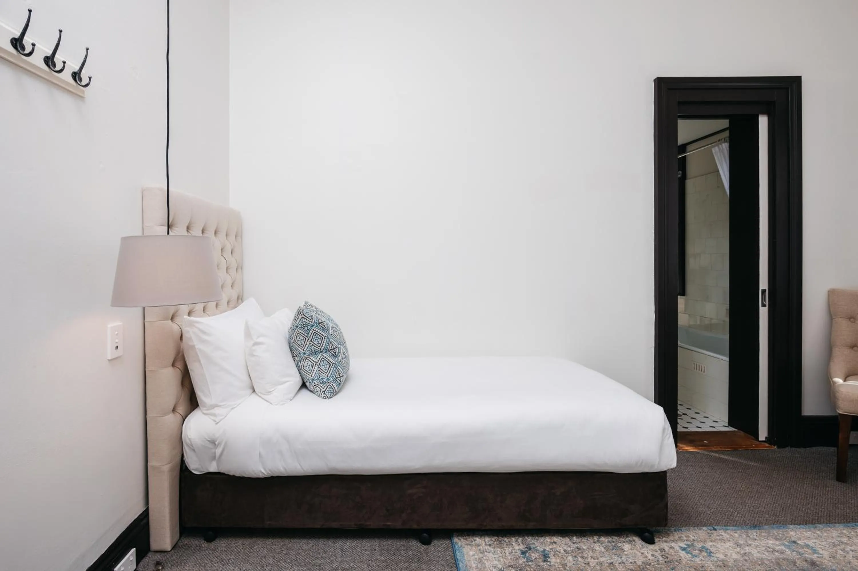 Bed in Hotel Etico at Mount Victoria Manor