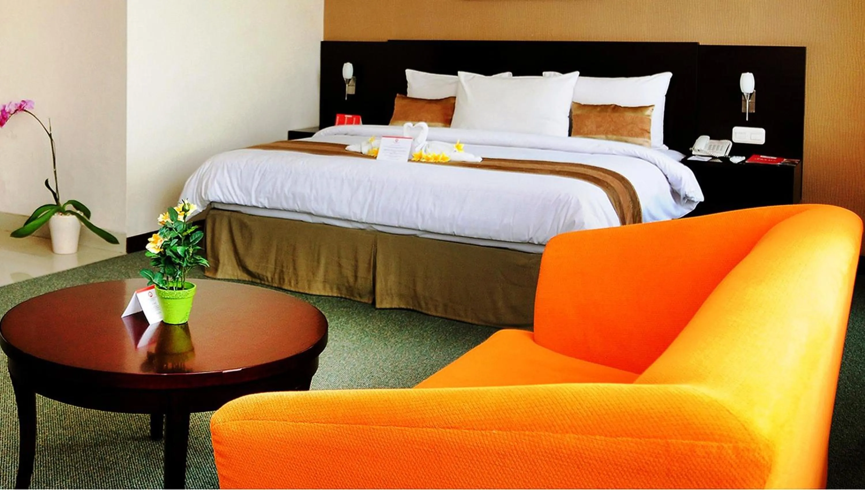 Bedroom in Asialink Premier hotel