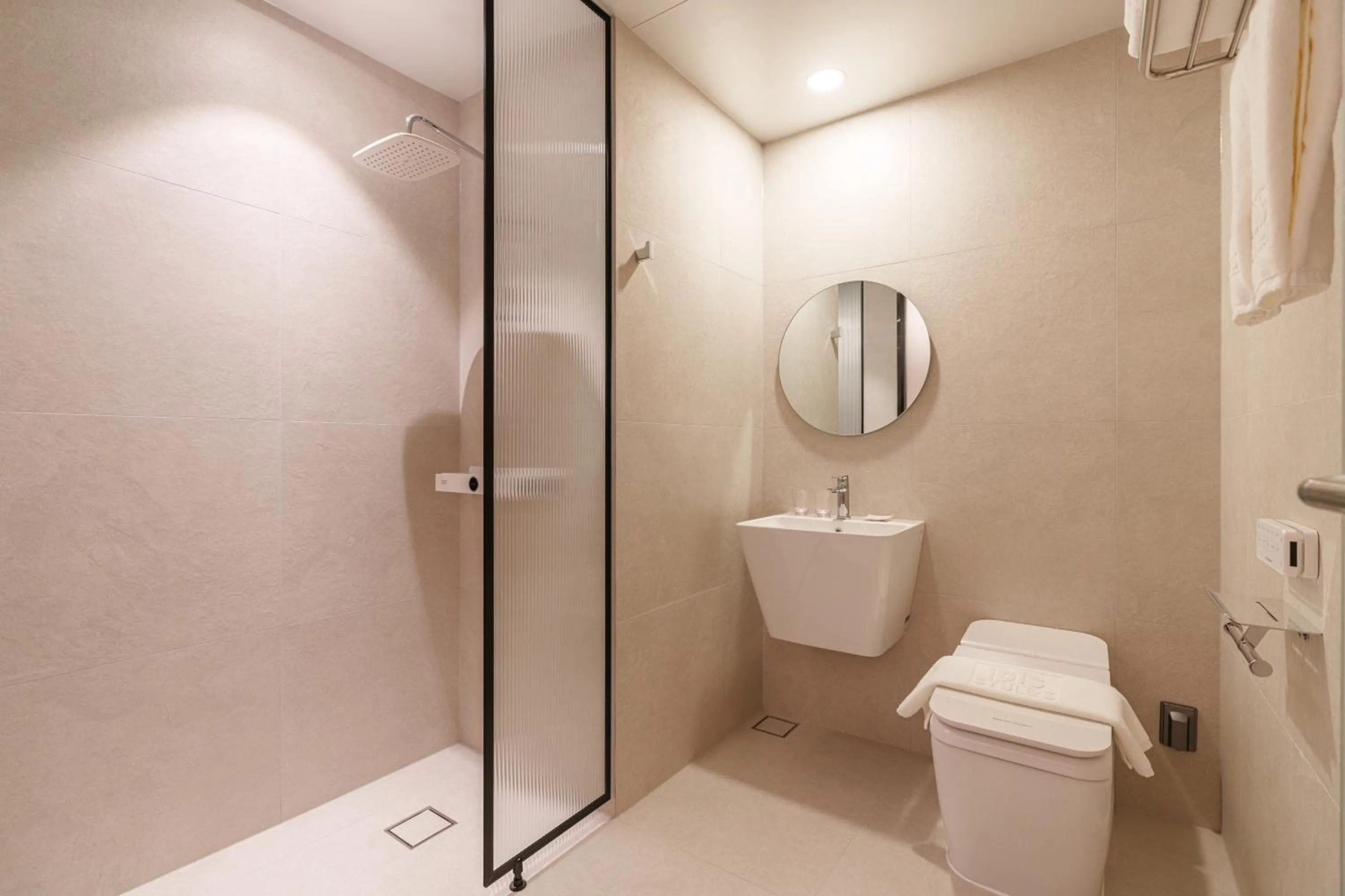 Shower in ibis Styles Ambassador Jeonju City Centre