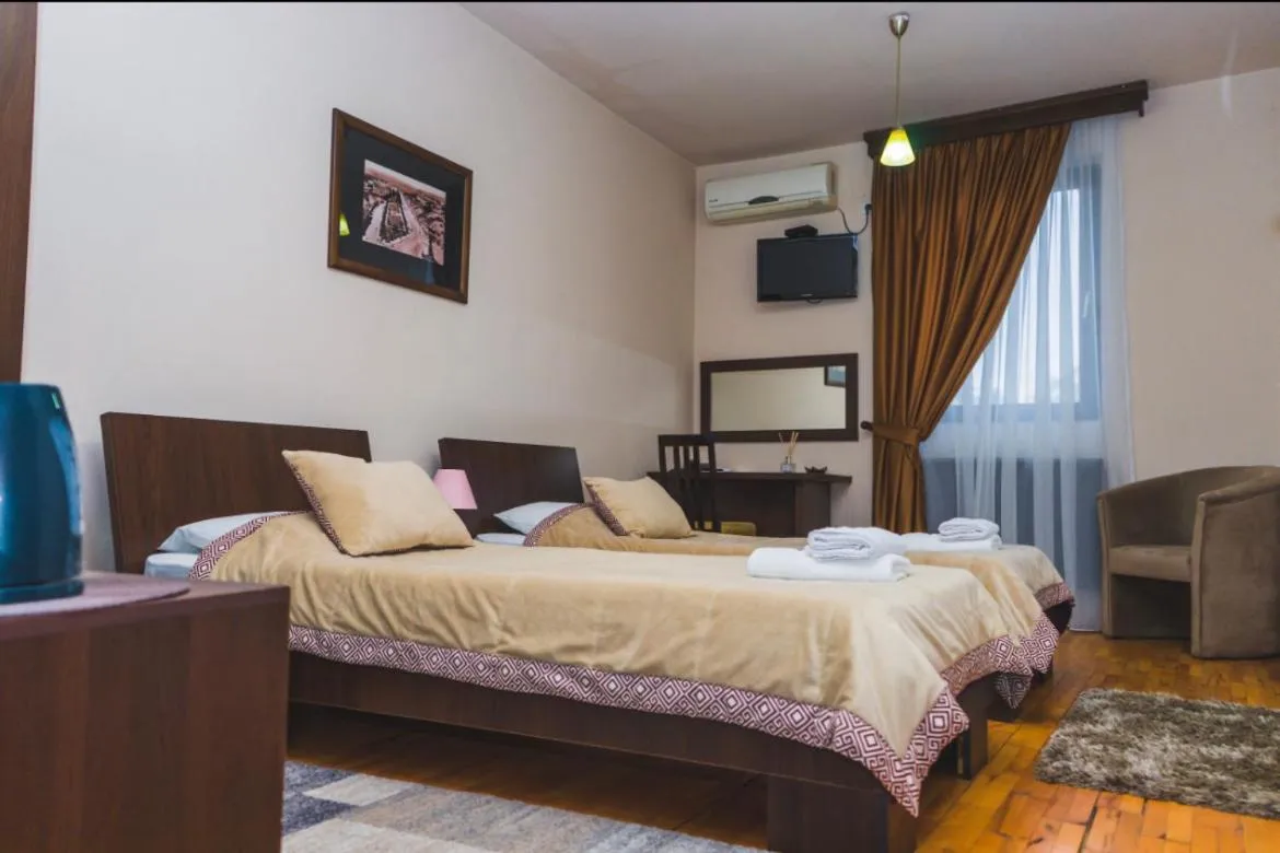 Bed in Garni Hotel City