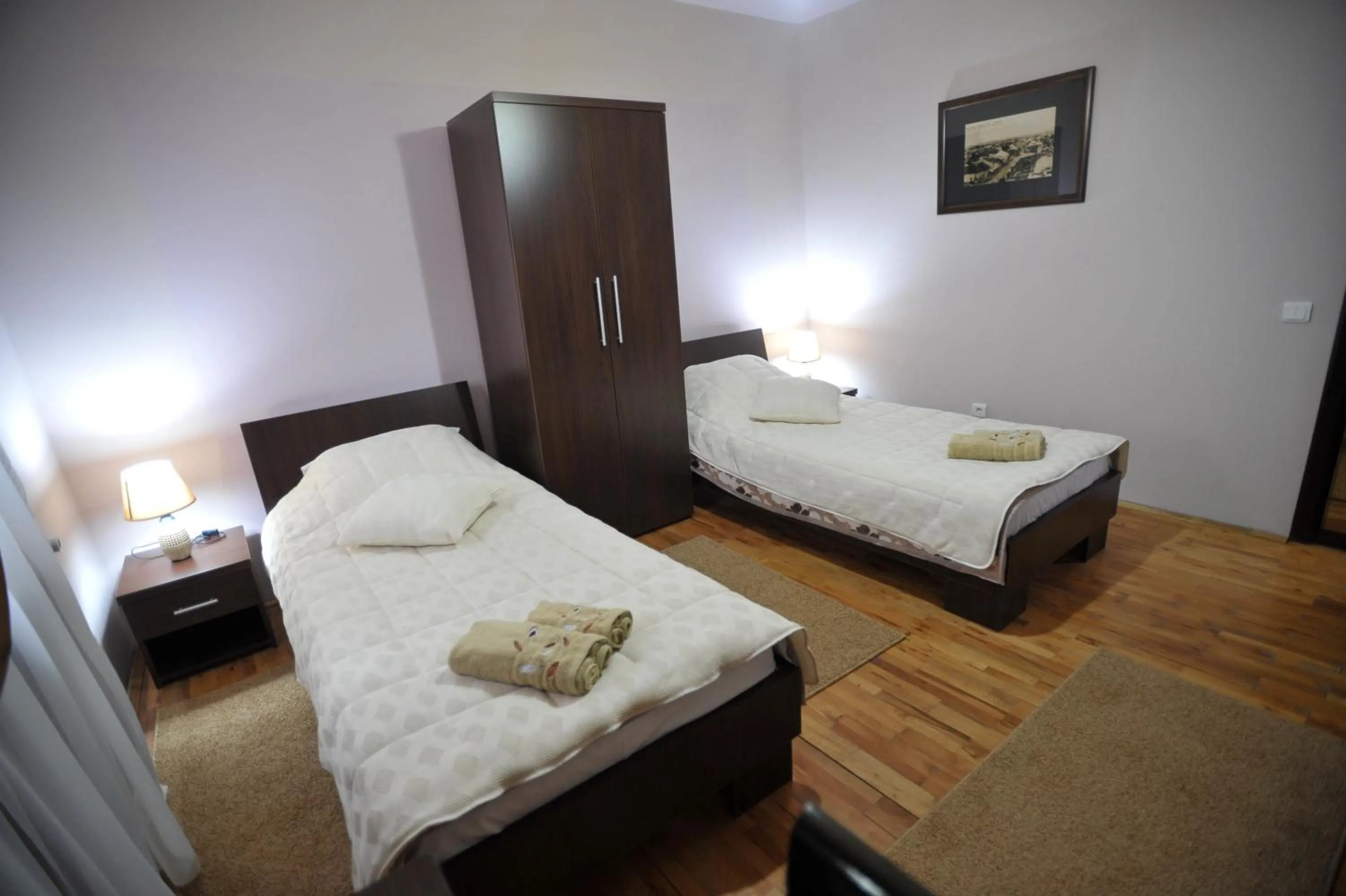 Bed in Garni Hotel City