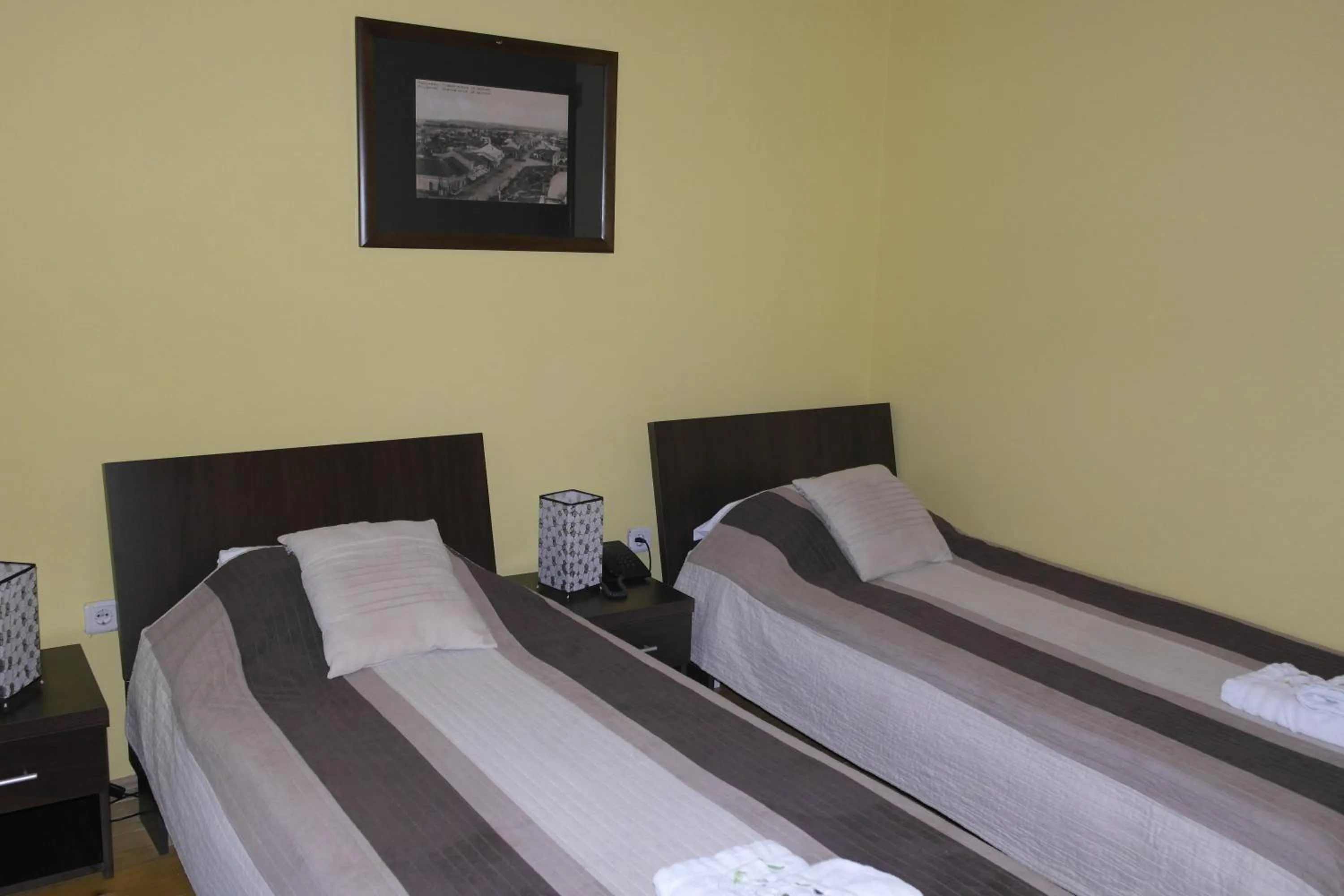Bed in Garni Hotel City