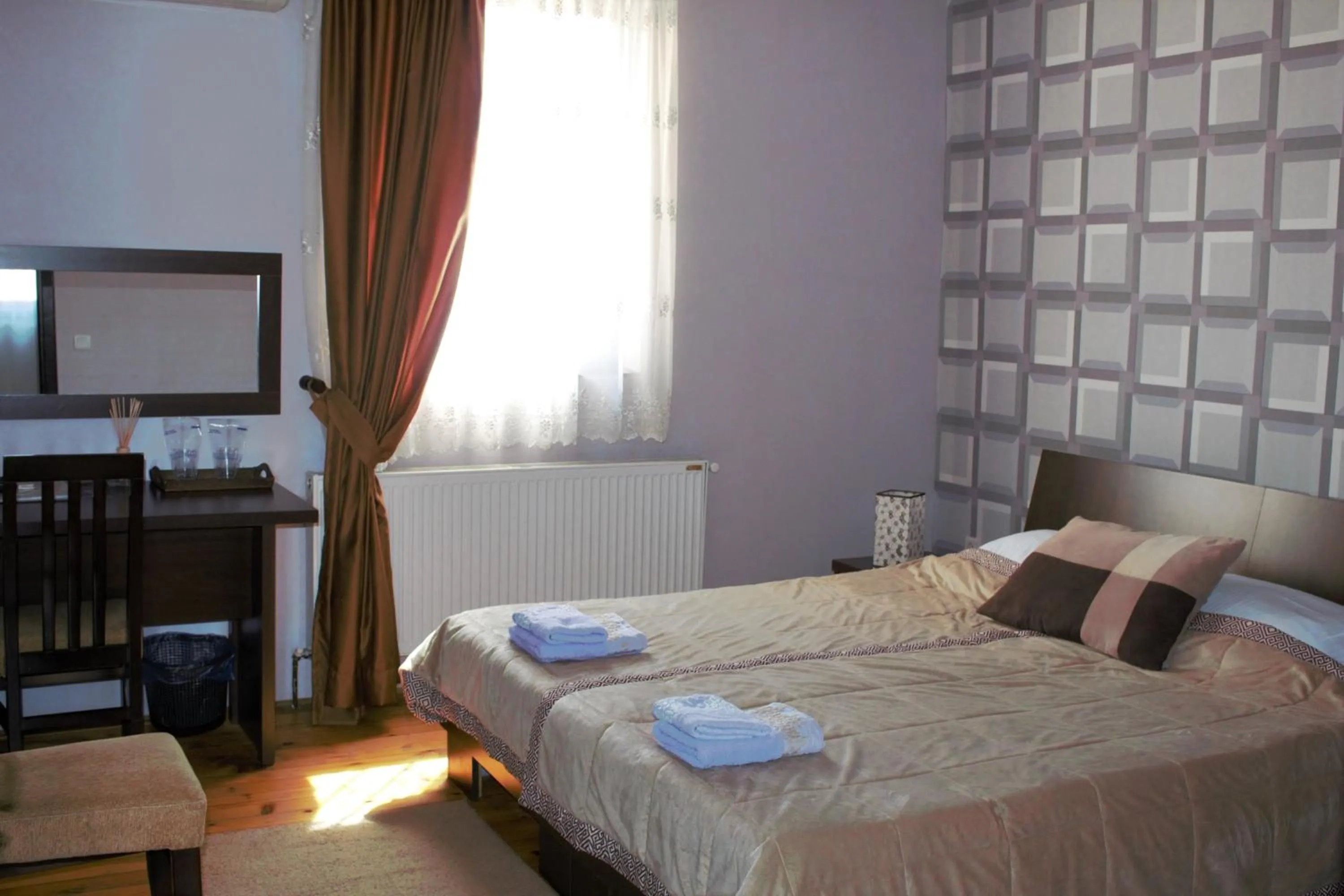 Bed in Garni Hotel City