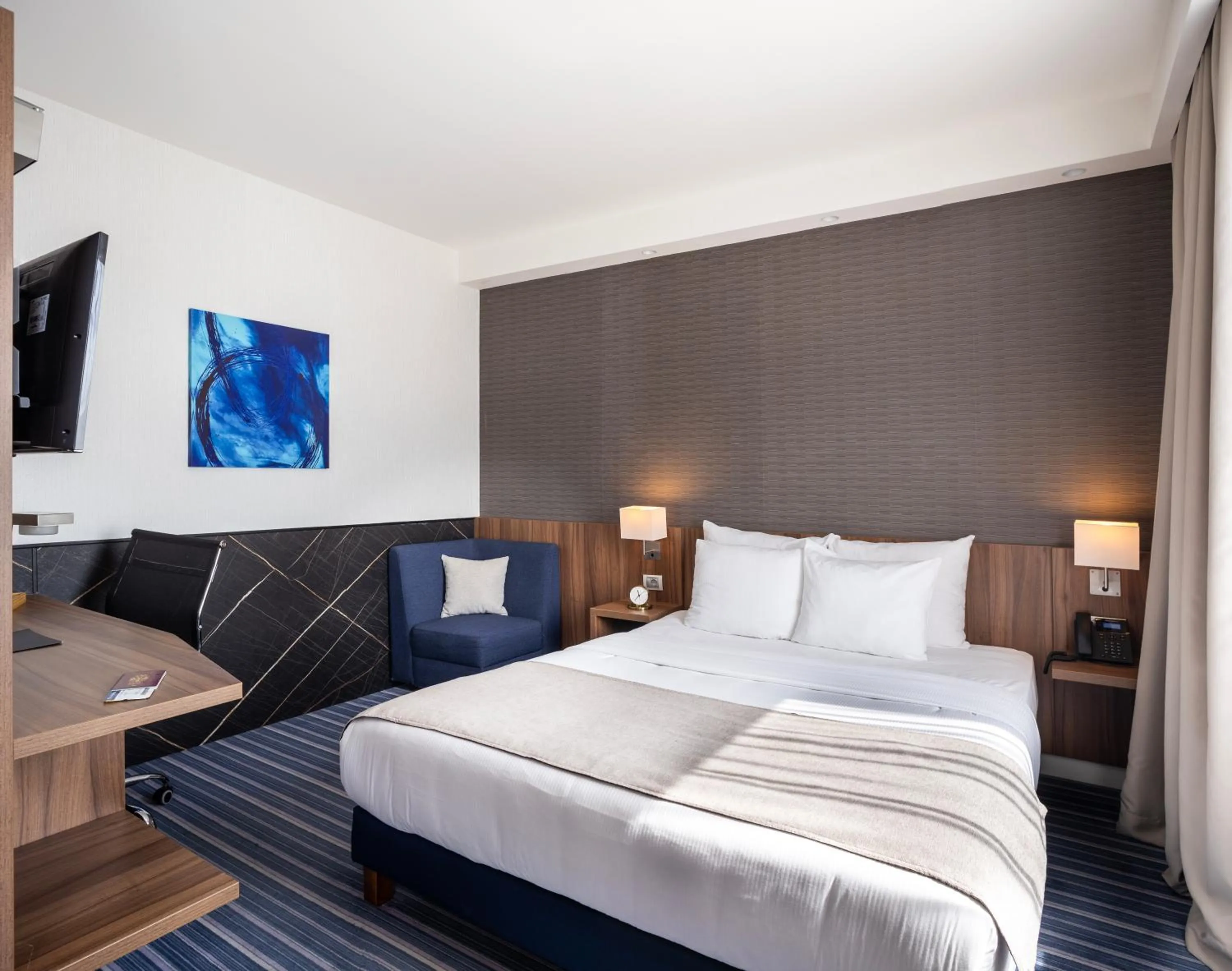 Bed in Nobel Palace Hotel