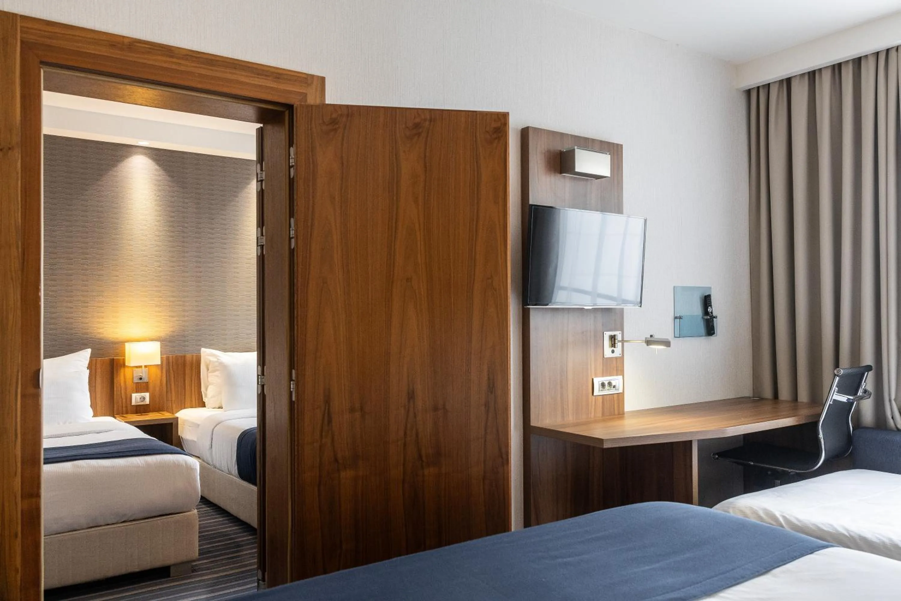 Bed in Nobel Palace Hotel