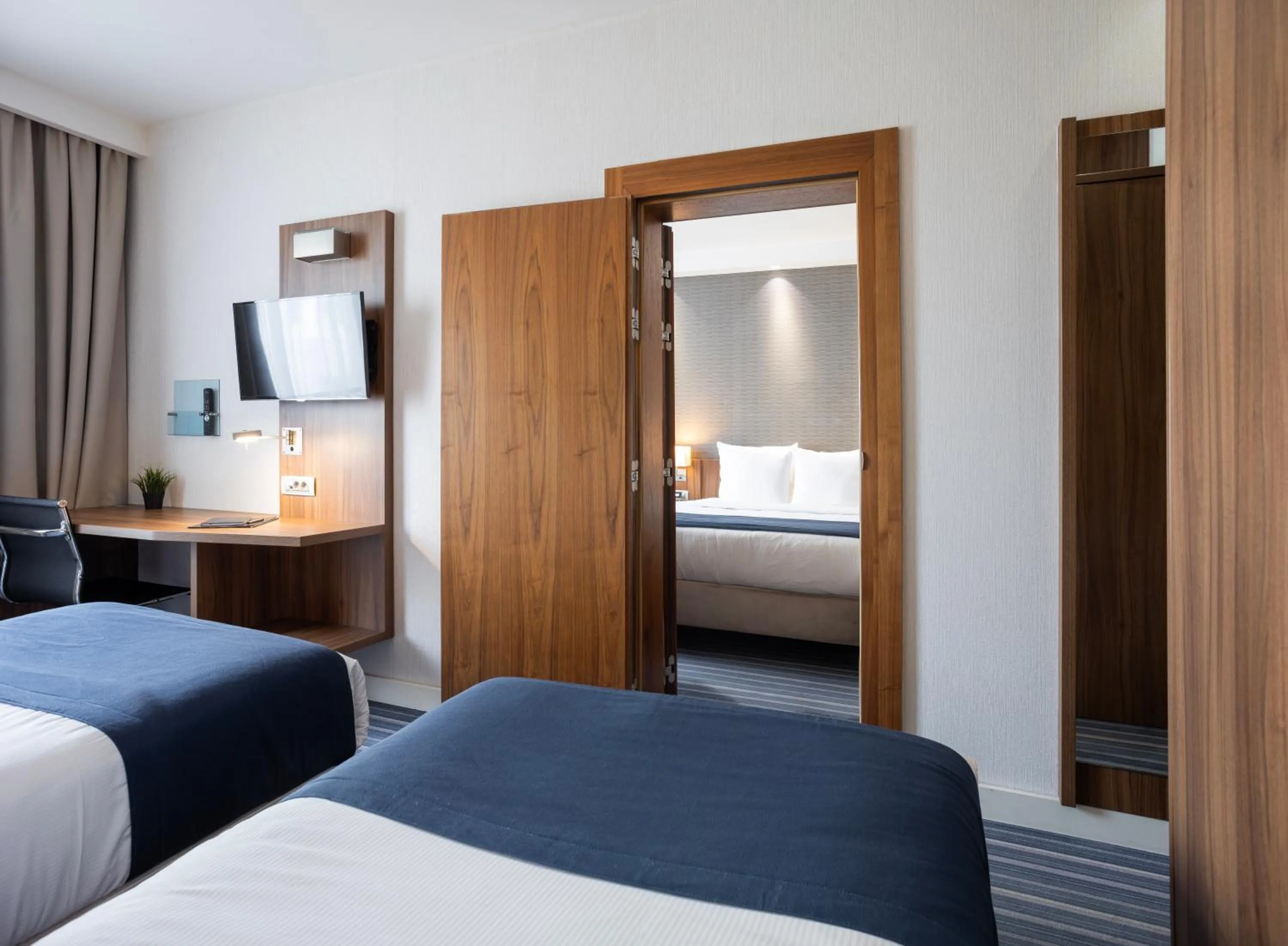 Bed in Nobel Palace Hotel