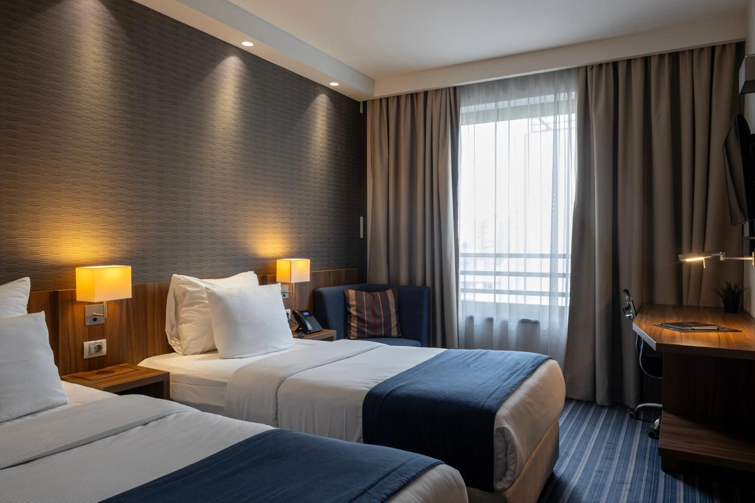 Bed in Nobel Palace Hotel