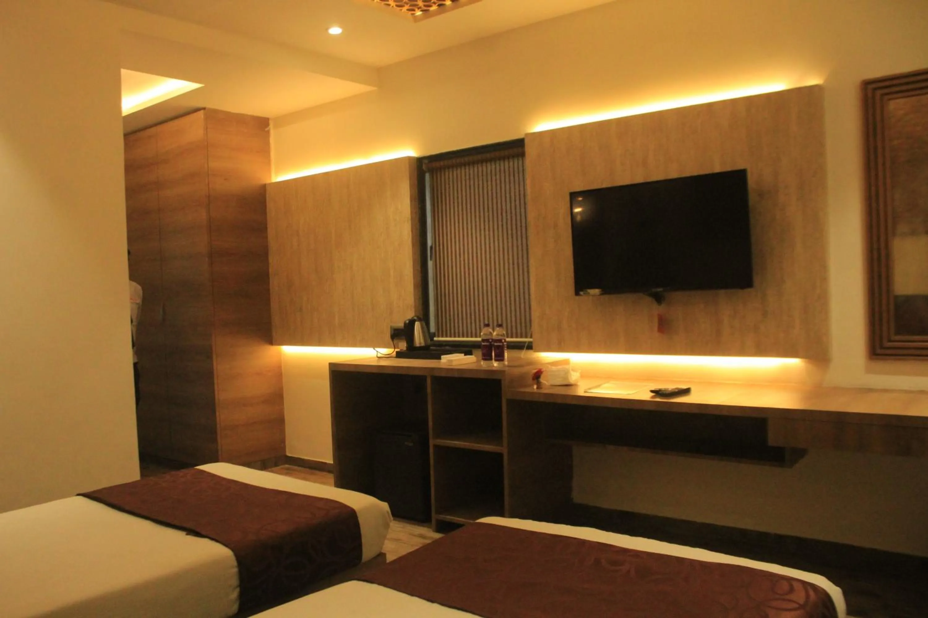 Bed in Hotel Sahyadri