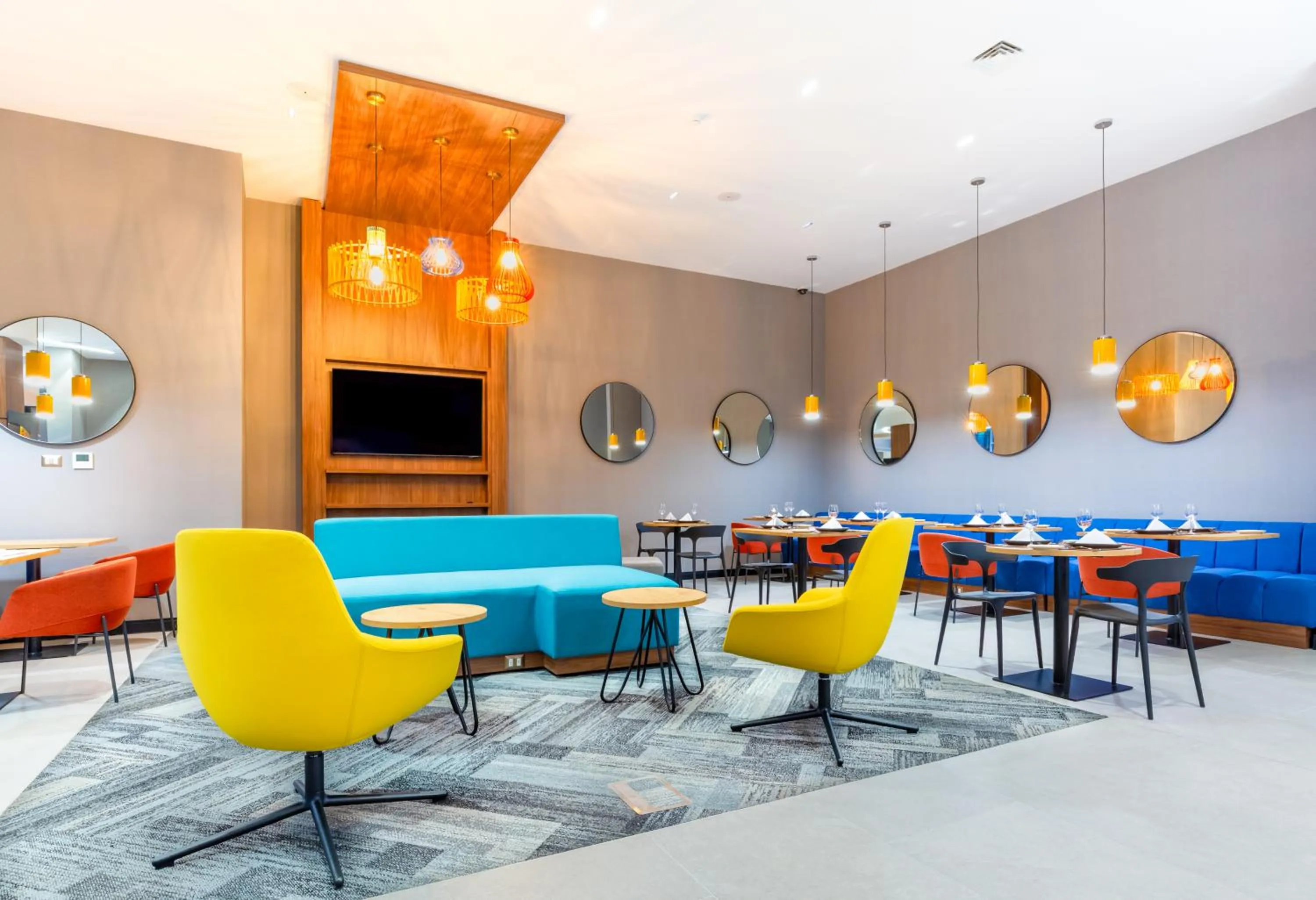 Communal lounge/ TV room in Tru By Hilton Chillan Ferrat