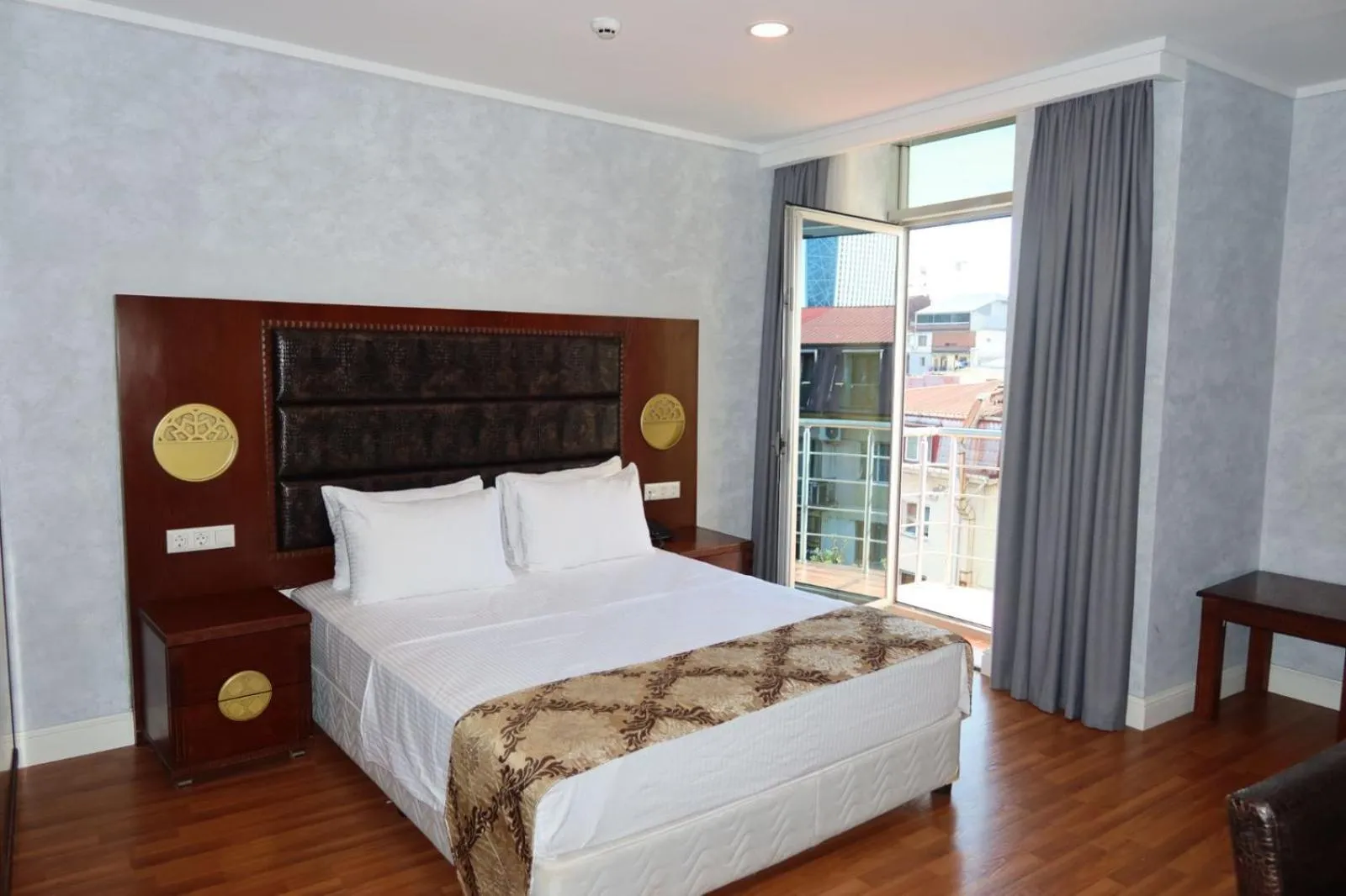 Photo of the whole room, Bed in Era Palace Batumi