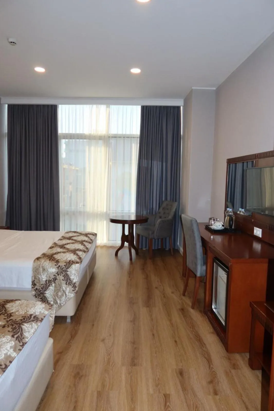 Photo of the whole room, Bed in Era Palace Batumi