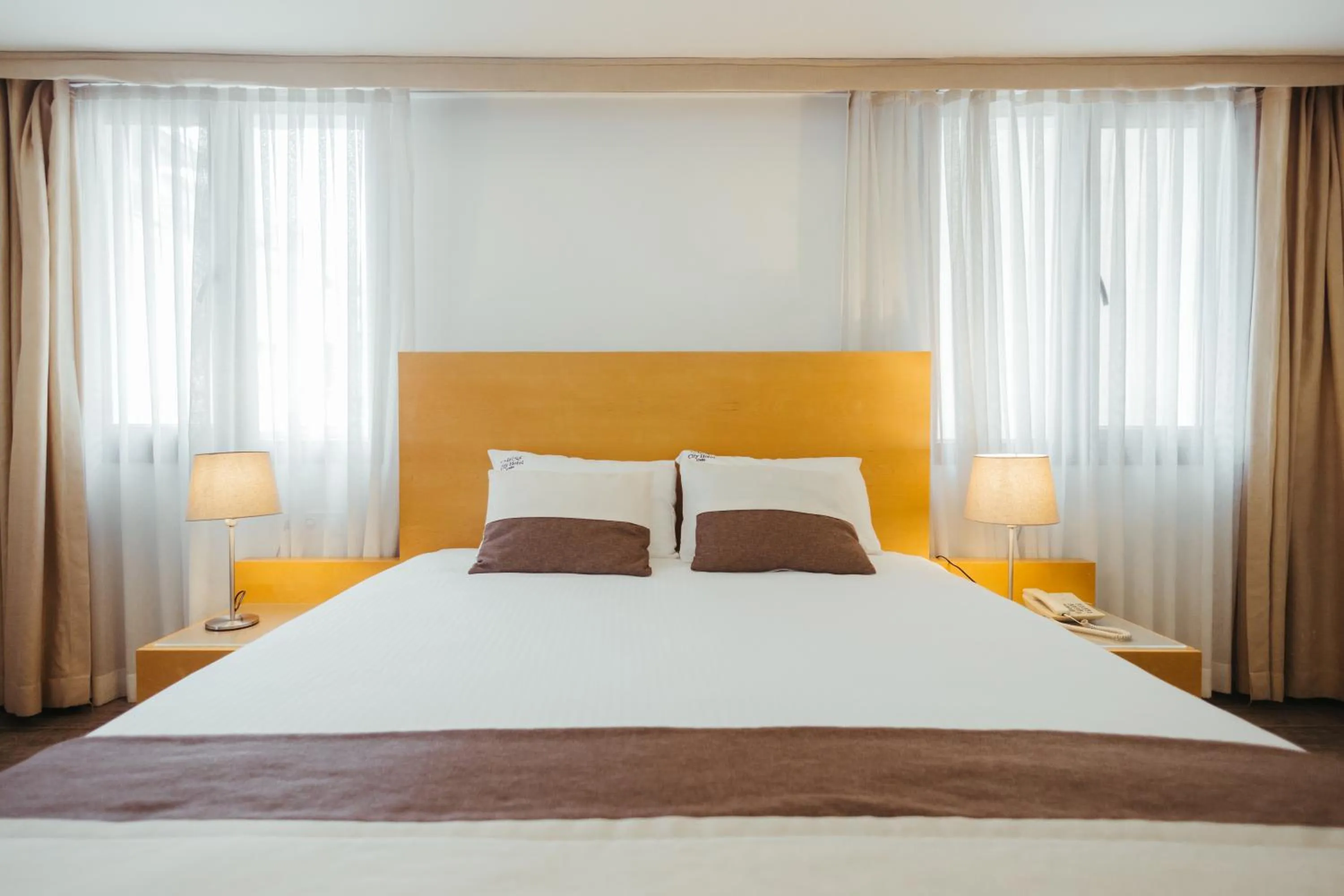 Bed in MB City Hotel