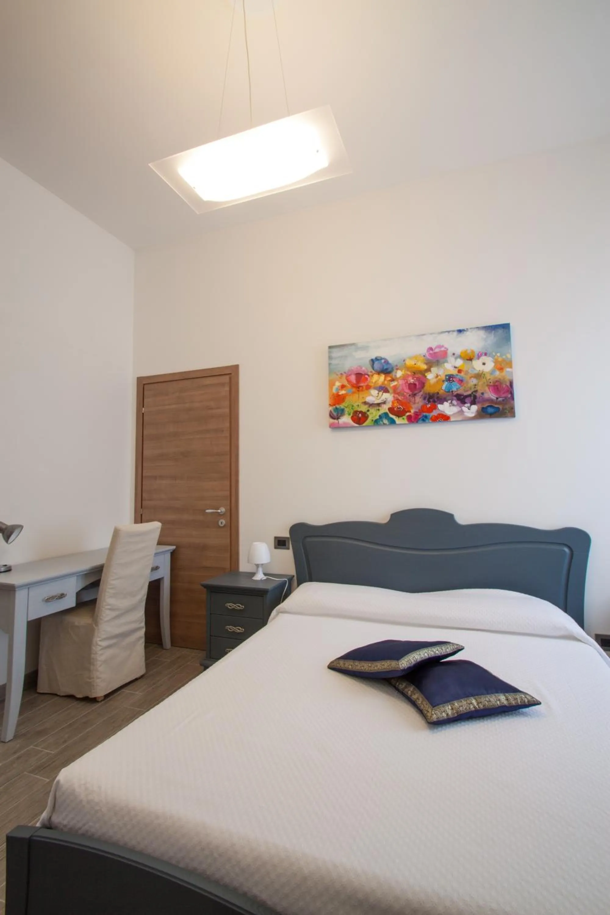 Bed in Palazzo di Primavera Guest House