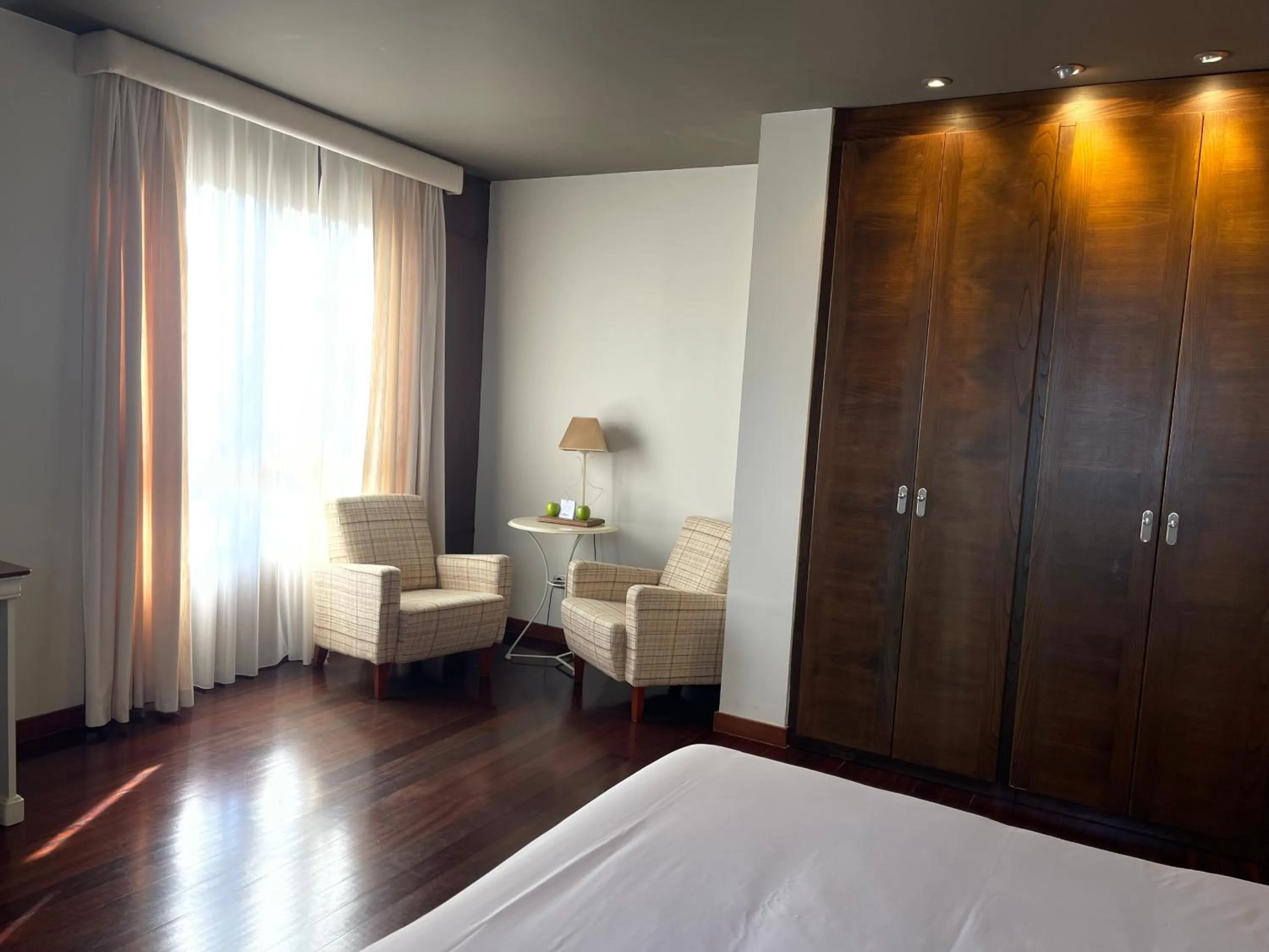 Seating area, Bed in Hosteria de Torazo Nature Hotel & Spa