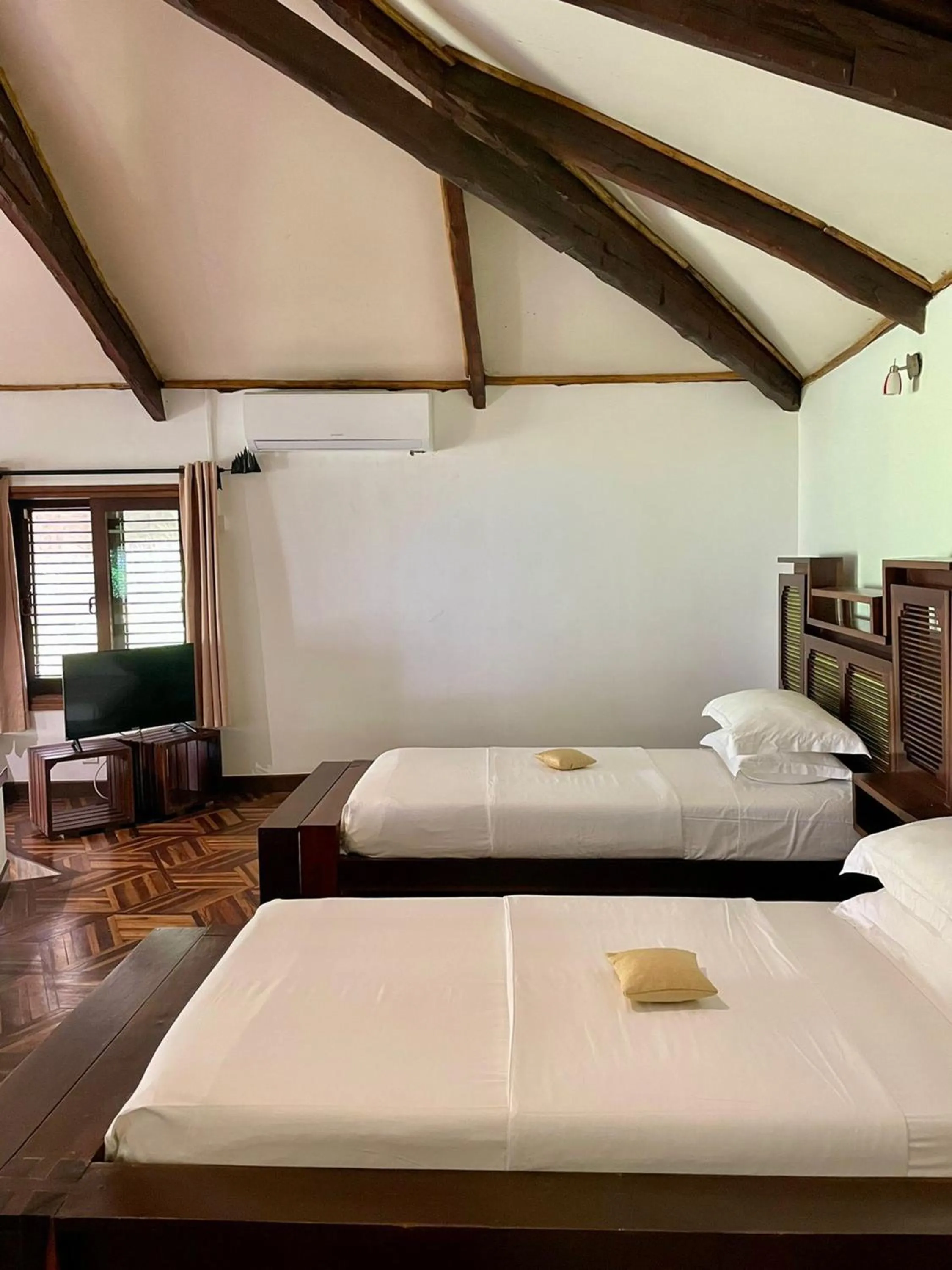 Bed in Ravintsara Wellness Hotel