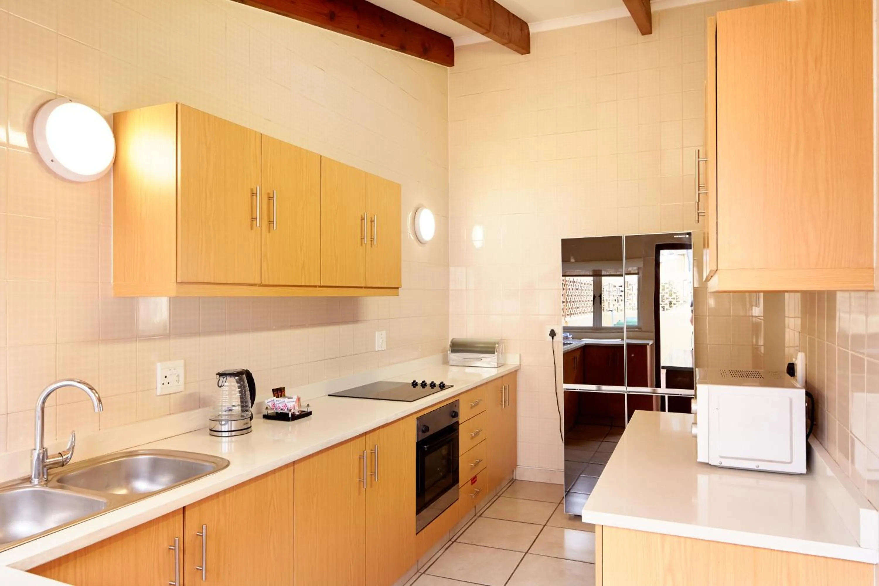 Kitchen or kitchenette in First Group Chaka's Rock Chalets