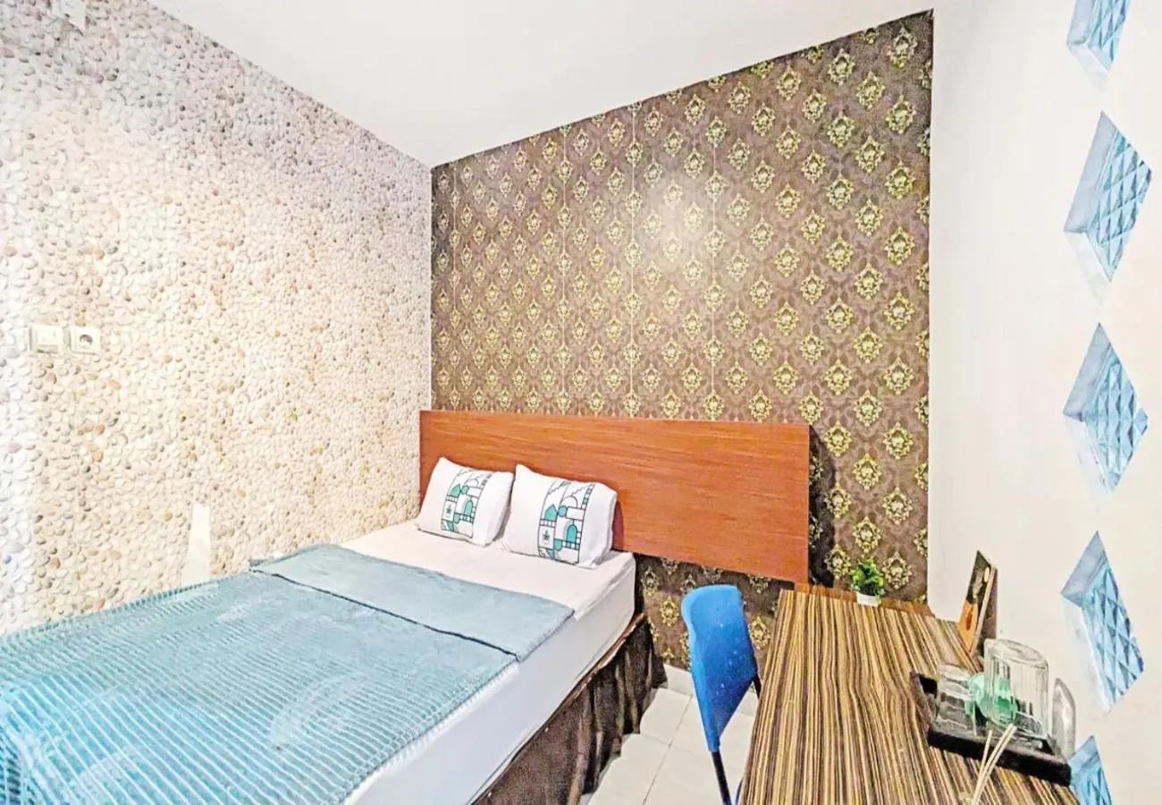 Bed in 99 Guest House