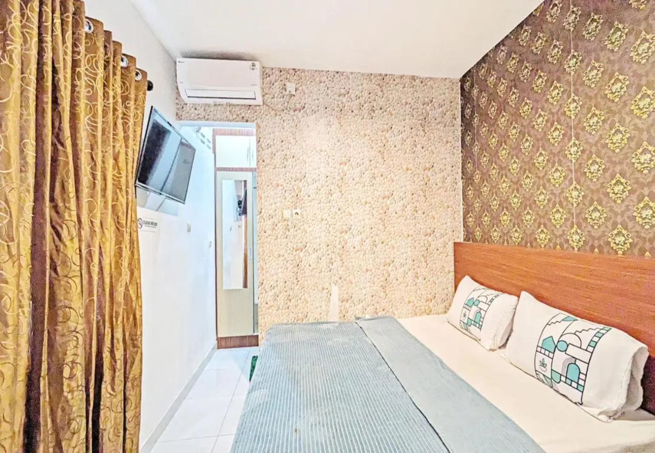 Bed in 99 Guest House