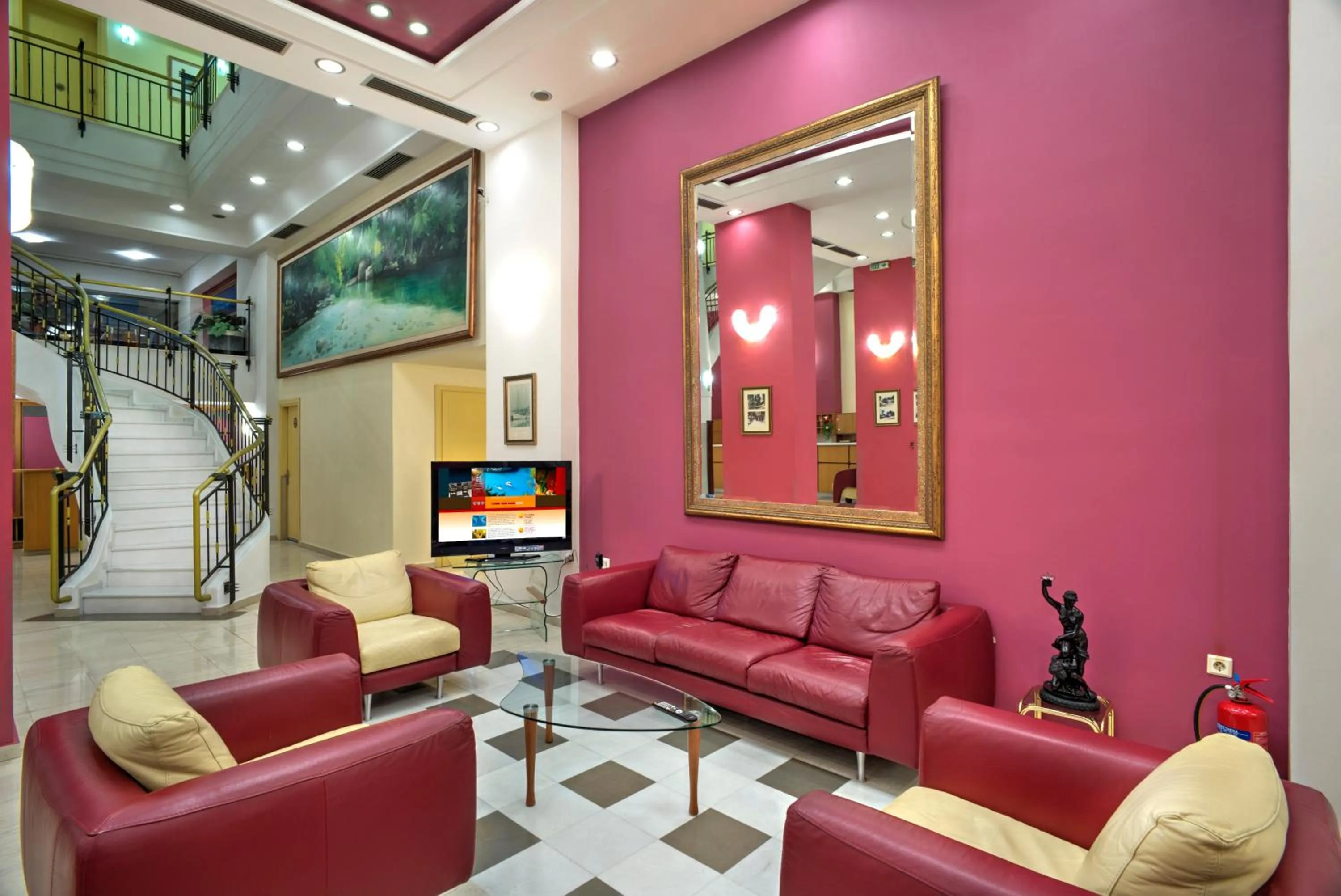 Communal lounge/ TV room in Angelika Pallas Hotel